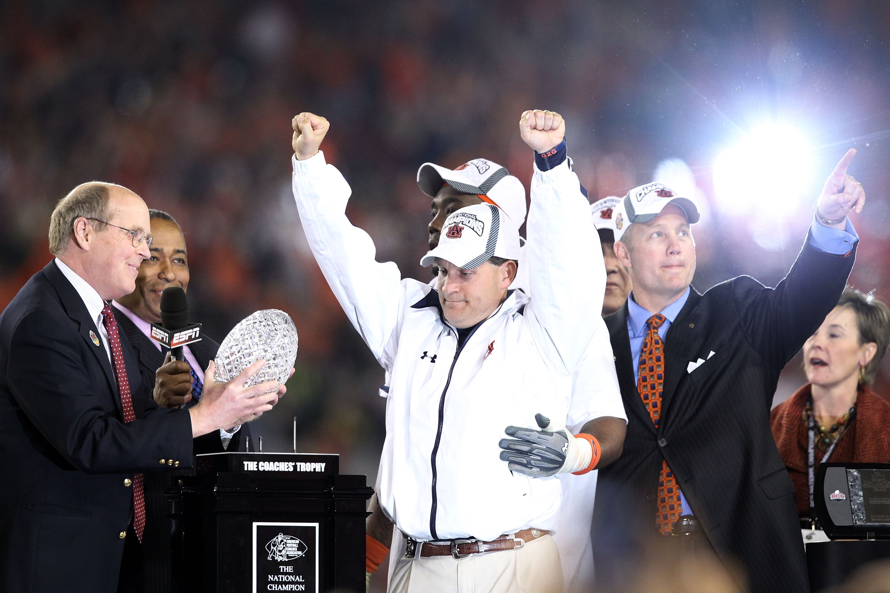 GLENDALE, AZ - JANUARY 10:  Head coach Gene Chizik of the Auburn Tigers celebrates the Tigers 22-19 victory against the Oregon Ducks during the Tostitos BCS National Championship Game at University of Phoenix Stadium on January 10, 2011 in Glendale, Arizo