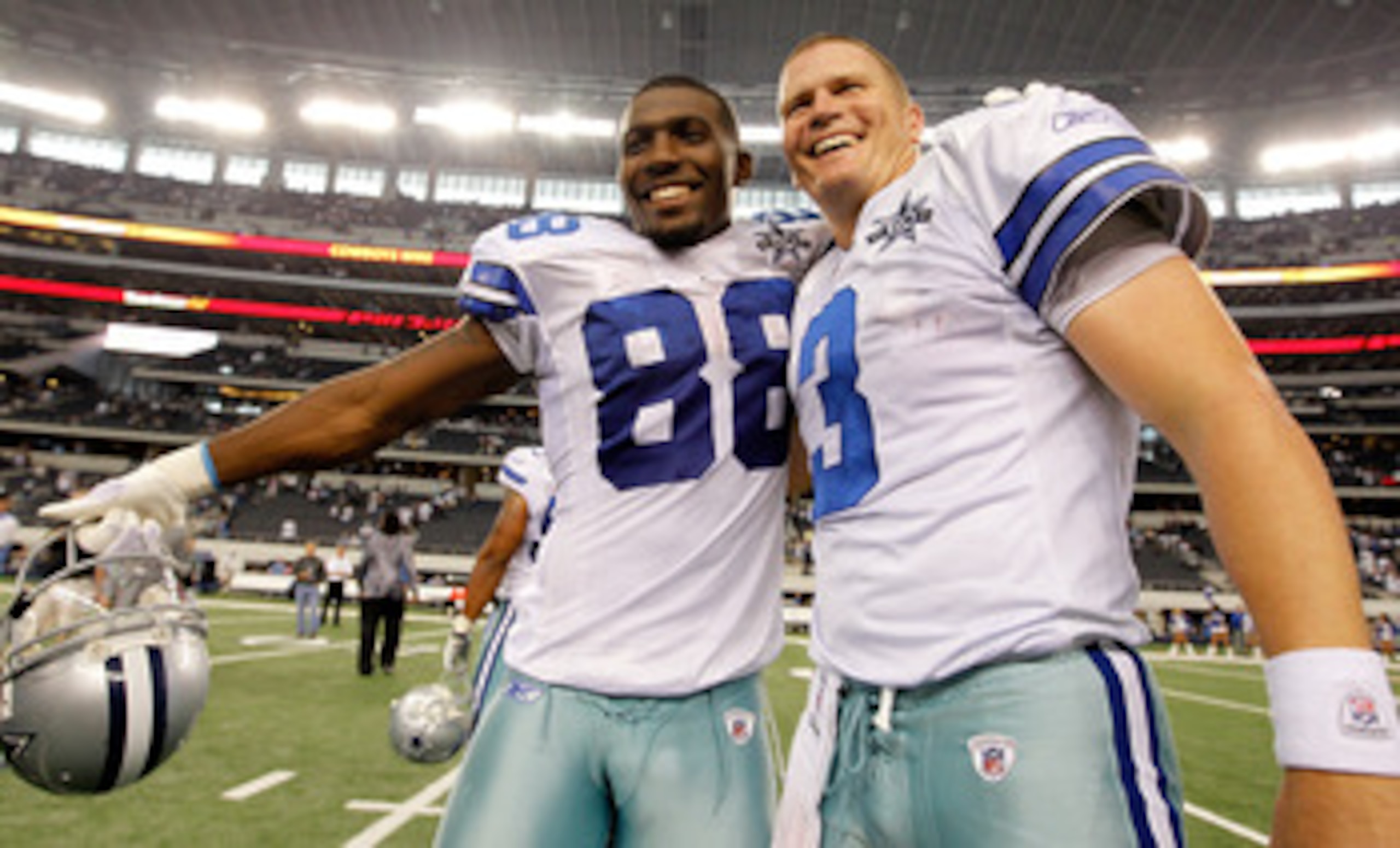 ARLINGTON, TX - NOVEMBER 21:  Wide receiver Dez Bryant #88 of the Dallas Cowboys celebrates with quarterback Jon Kitna #3 after the Cowboys beat the Detroit Lions 35-19 at Cowboys Stadium on November 21, 2010 in Arlington, Texas.  (Photo by Tom Pennington