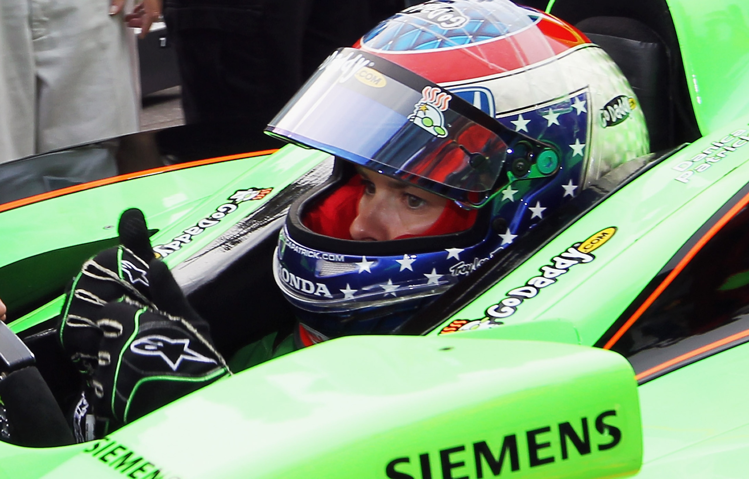 INDIANAPOLIS, IN - MAY 22:  Danica Patrick, driver of the #7 Team GoDaddy Dallara Honda, gives two thumbs up after qualifying for the Indianapolis 500 on May 22, 2011 at Indianapolis Motor Speedway in Indianapolis, Indiana.  (Photo by Jamie Squire/Getty I