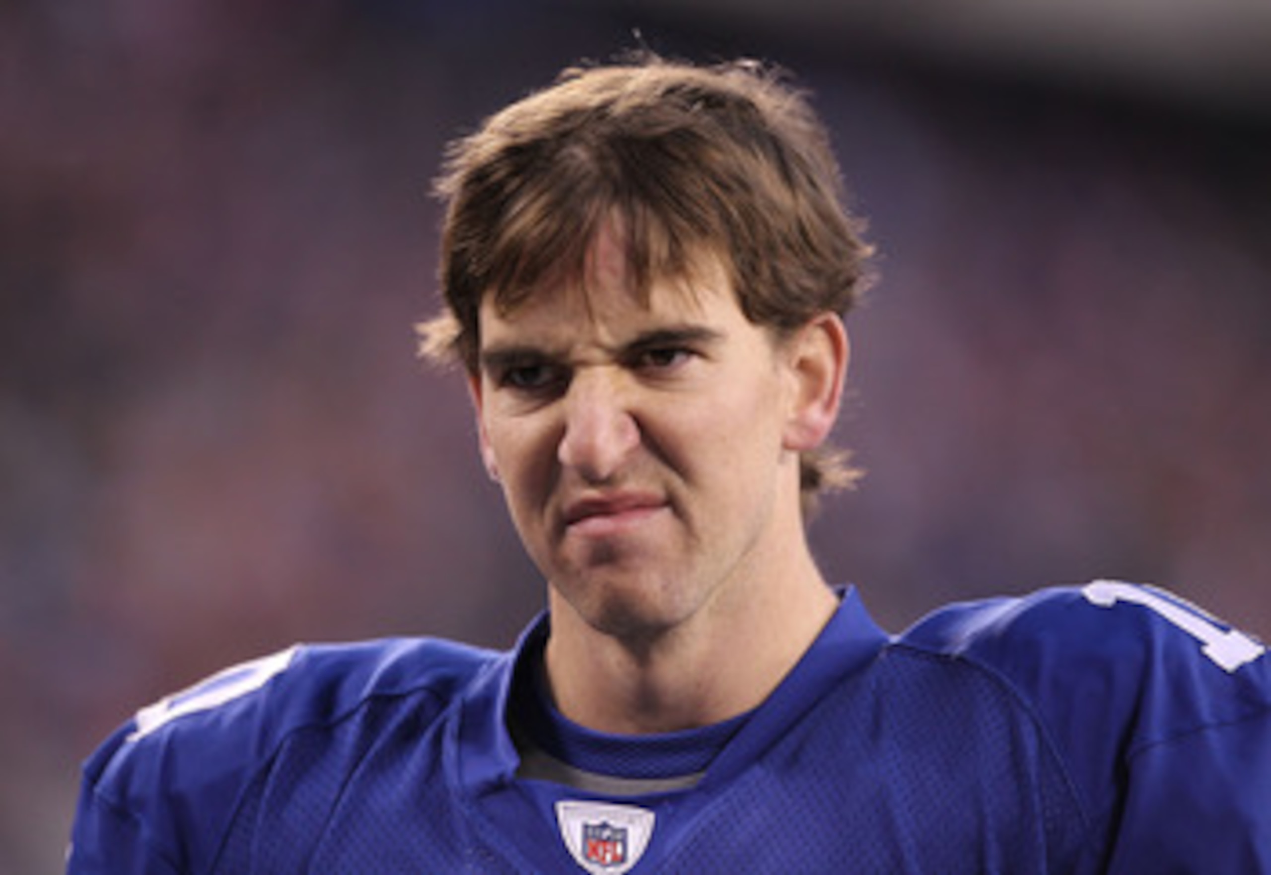 EAST RUTHERFORD, NJ - DECEMBER 19:  Eli Manning #10 of the New York Giants walks off the field dejected after losing to the Philadelphia Eagles 38-31  on December 19, 2010 at The New Meadowlands Stadium in East Rutherford, New Jersey.  (Photo by Al Bello/