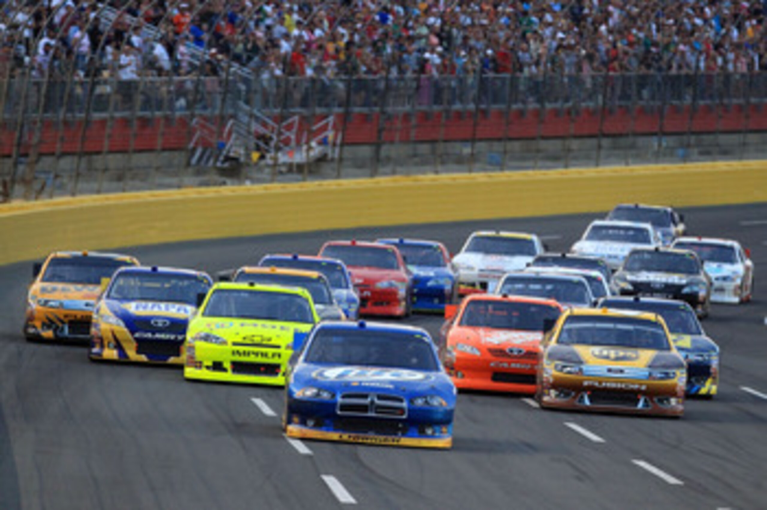 CHARLOTTE, NC - MAY 21:  Brad Keselowski, driver of the #2 Miller Lite Dodge, leads a group of cars during the NASCAR Sprint Showdown at Charlotte Motor Speedway on May 21, 2011 in Charlotte, North Carolina.  (Photo by Streeter Lecka/Getty Images)