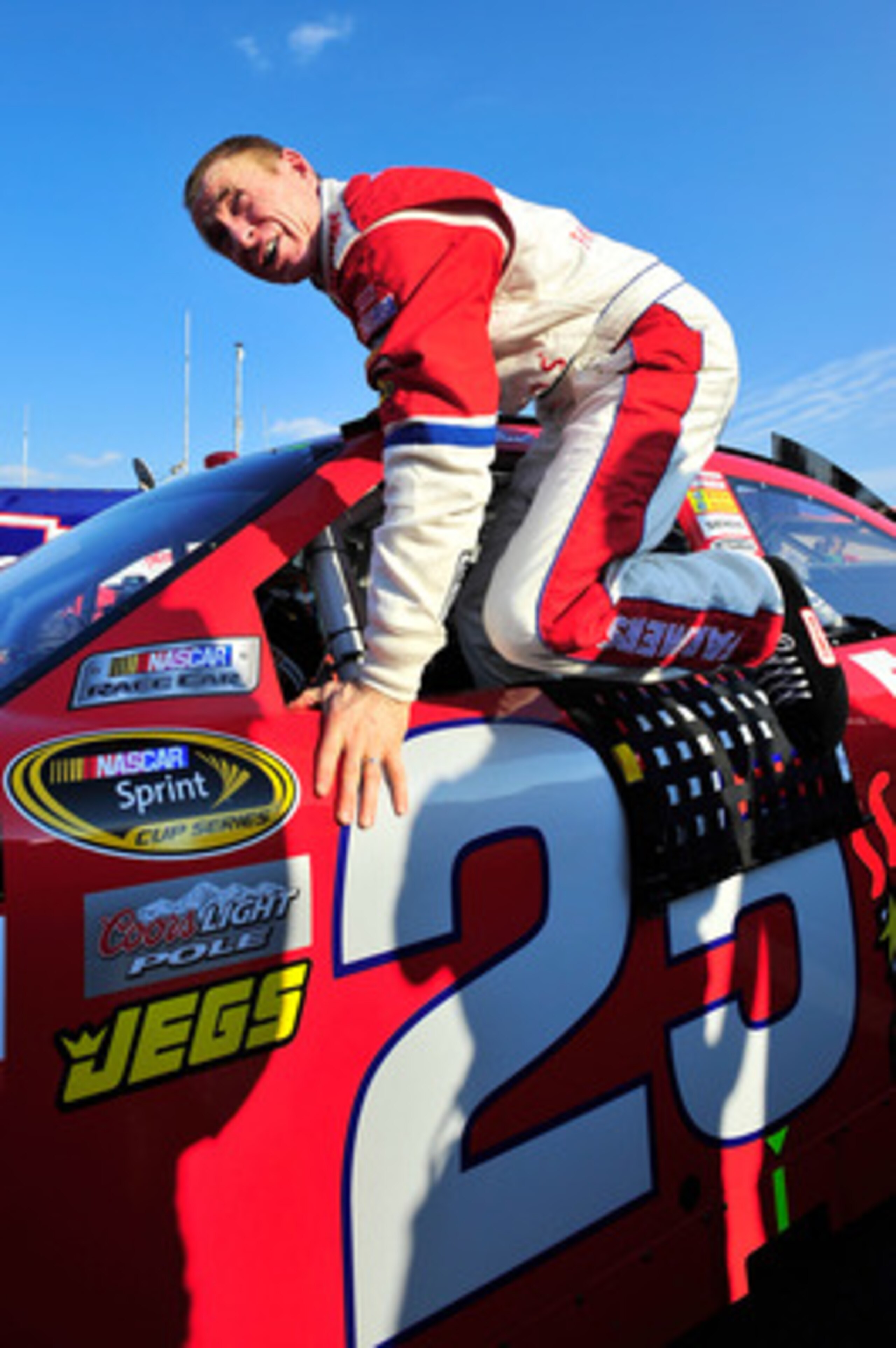 CHARLOTTE, NC - MAY 20:  Mark Martin, driver of the #25 Farmers Insurance Chevrolet, climbs out of his car on the grid during qualifying for the NASCAR Sprint All-Star Race at Charlotte Motor Speedway on May 20, 2011 in Charlotte, North Carolina.  (Photo 