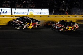 CHARLOTTE, NC - MAY 21:  Kasey Kahne, driver of the #4 Red Bull Toyota, hits the wall during the NASCAR Sprint All-Star Race at Charlotte Motor Speedway on May 21, 2011 in Charlotte, North Carolina.  (Photo by John Harrelson/Getty Images for NASCAR)