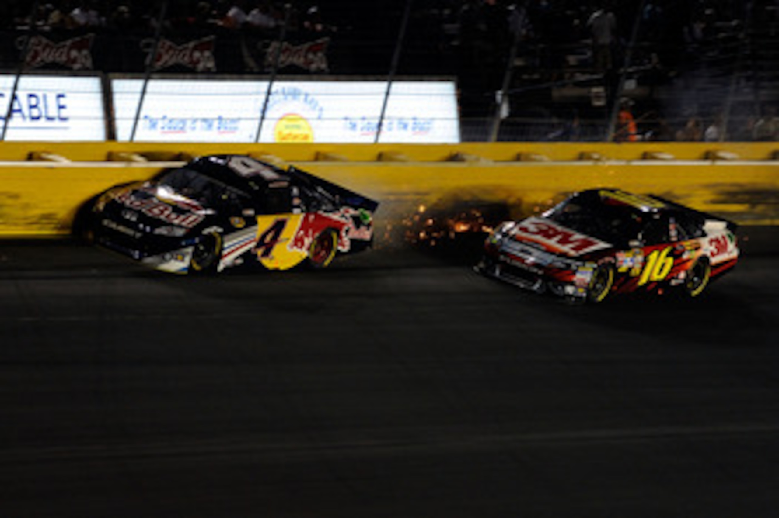 CHARLOTTE, NC - MAY 21:  Kasey Kahne, driver of the #4 Red Bull Toyota, hits the wall during the NASCAR Sprint All-Star Race at Charlotte Motor Speedway on May 21, 2011 in Charlotte, North Carolina.  (Photo by John Harrelson/Getty Images for NASCAR)