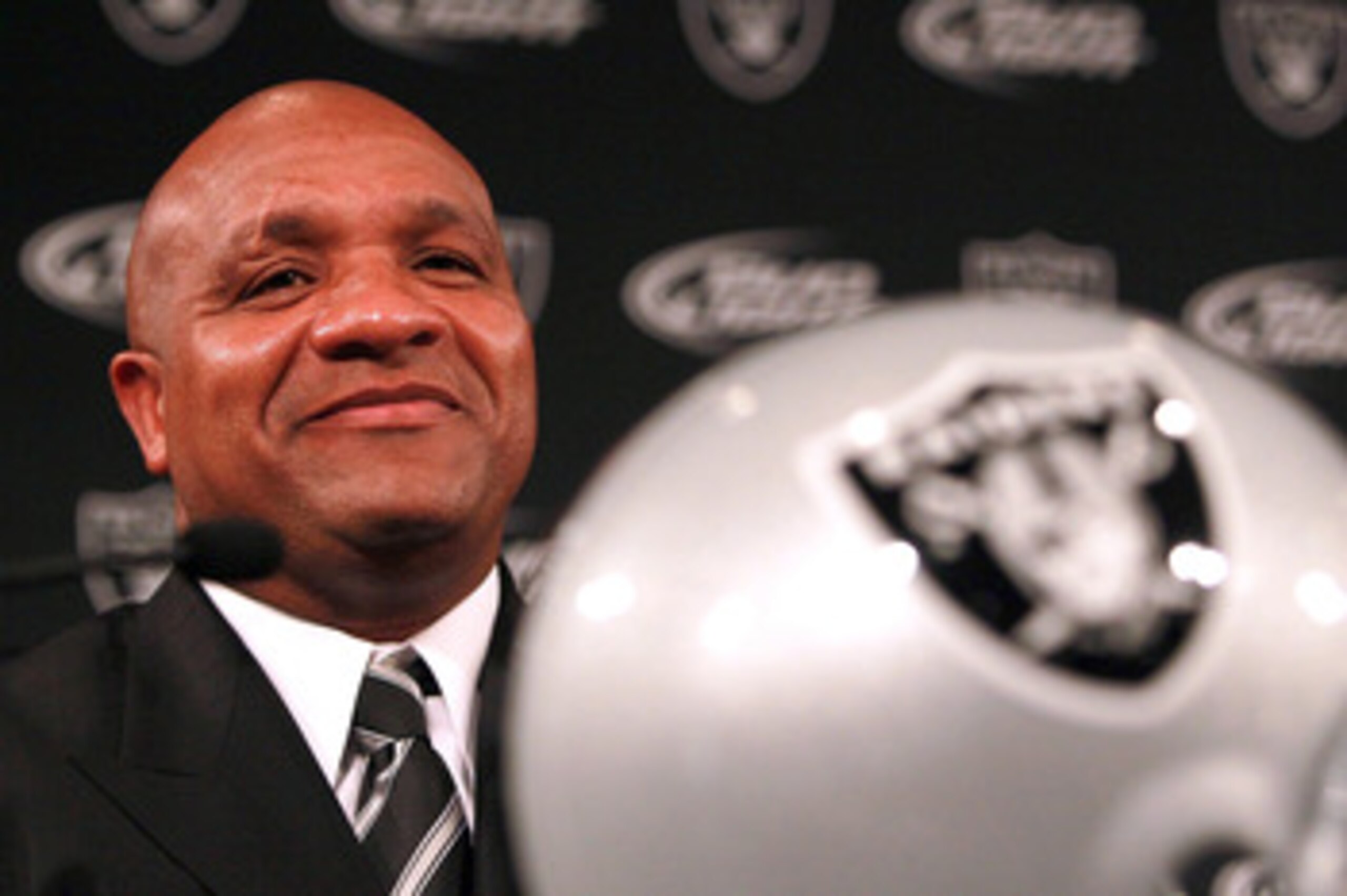 ALAMEDA, CA - JANUARY 18:  Hue Jackson looks on after he was introduced as the new head coach of the Oakland Raiders on January 18, 2011 in Alameda, California.  Hue Jackson was introduced as the new coach of the Oakland Raiders, replacing the fired Tom C