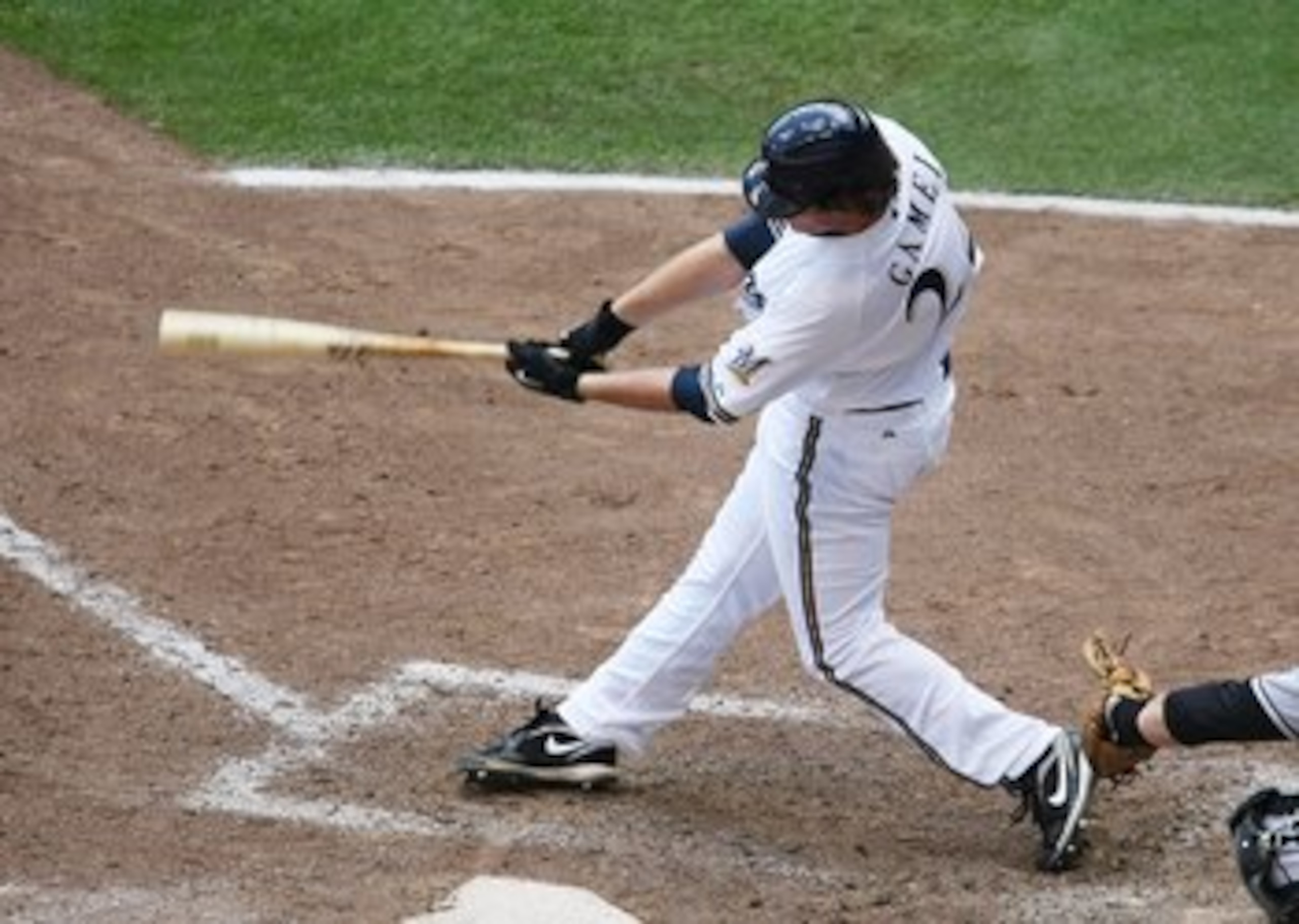 MILWAUKEE - MAY 14: Mat Gamel #24 of the Milwaukee Brewers swings at a pitch against the Florida Marlins on May 14, 2009 at Miller Park in Milwaukee, Wisconsin. The Brewers defeated the Marlins 5-3. (Photo by Jonathan Daniel/Getty Images)