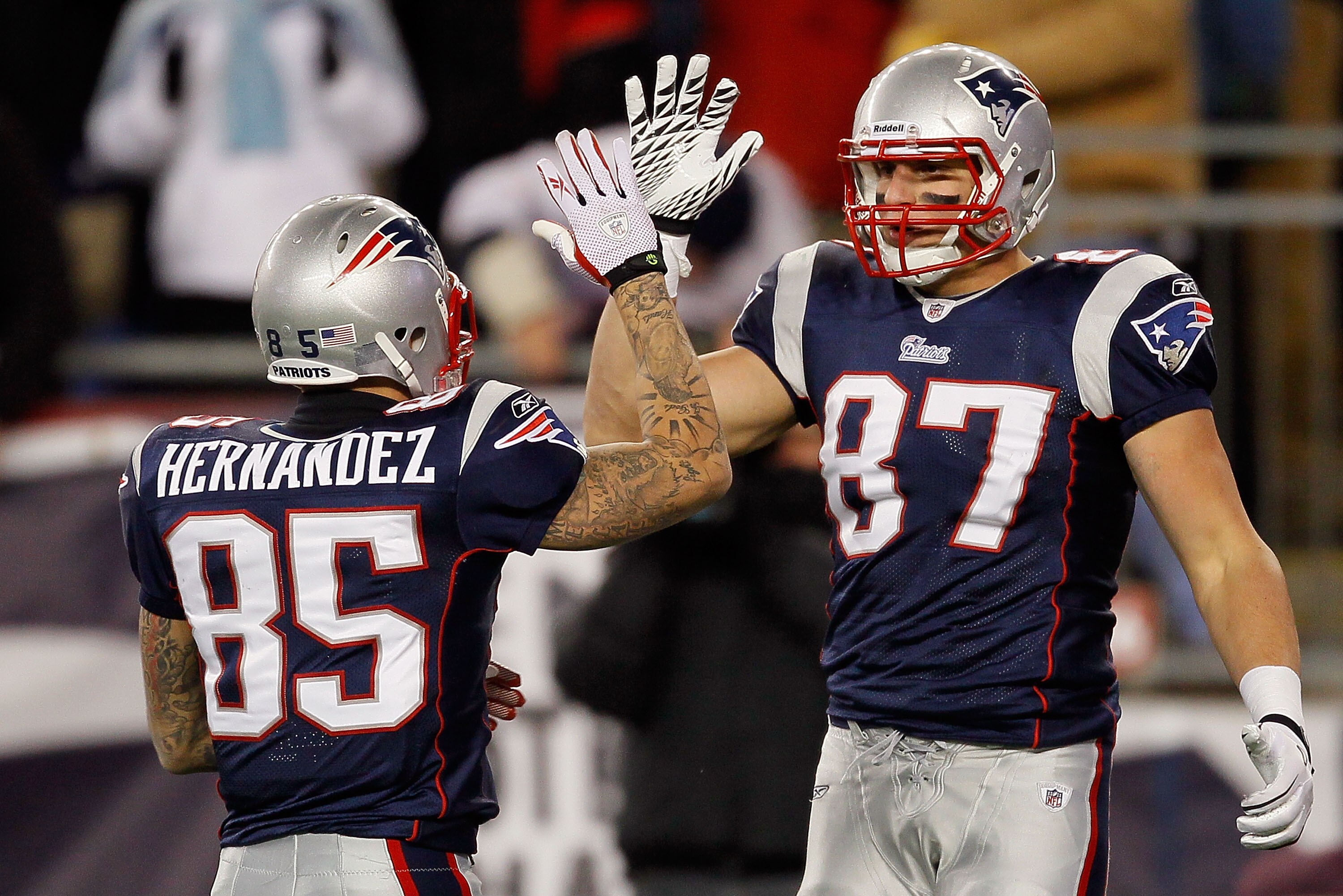 FOXBORO, MA - DECEMBER 06:  (L-R) Aaron Hernandez #85 and Rob Gronkowski #87 of the New England Patriots celebrate a play against the New York Jets at Gillette Stadium on December 6, 2010 in Foxboro, Massachusetts. The Patriots won 45-3. (Photo by Jim Rog