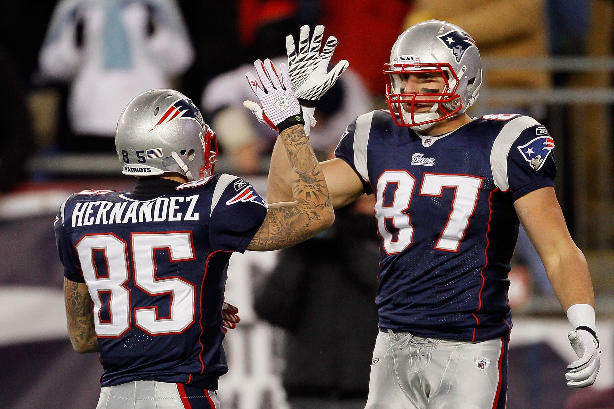 FOXBORO, MA - DECEMBER 06: (L-R) Aaron Hernandez #85 and Rob Gronkowski #87 of the New England Patriots celebrate a play against the New York Jets at Gillette Stadium on December 6, 2010 in Foxboro, Massachusetts. The Patriots won 45-3. (Photo by Jim Rog FOXBORO, MA - DECEMBER 06: (L-R) Aaron Hernandez #85 and Rob Gronkowski #87 of the New England Patriots celebrate a play against the New York Jets at Gillette Stadium on December 6, 2010 in Foxboro, Massachusetts. The Patriots won 45-3. (Photo by Jim Rog