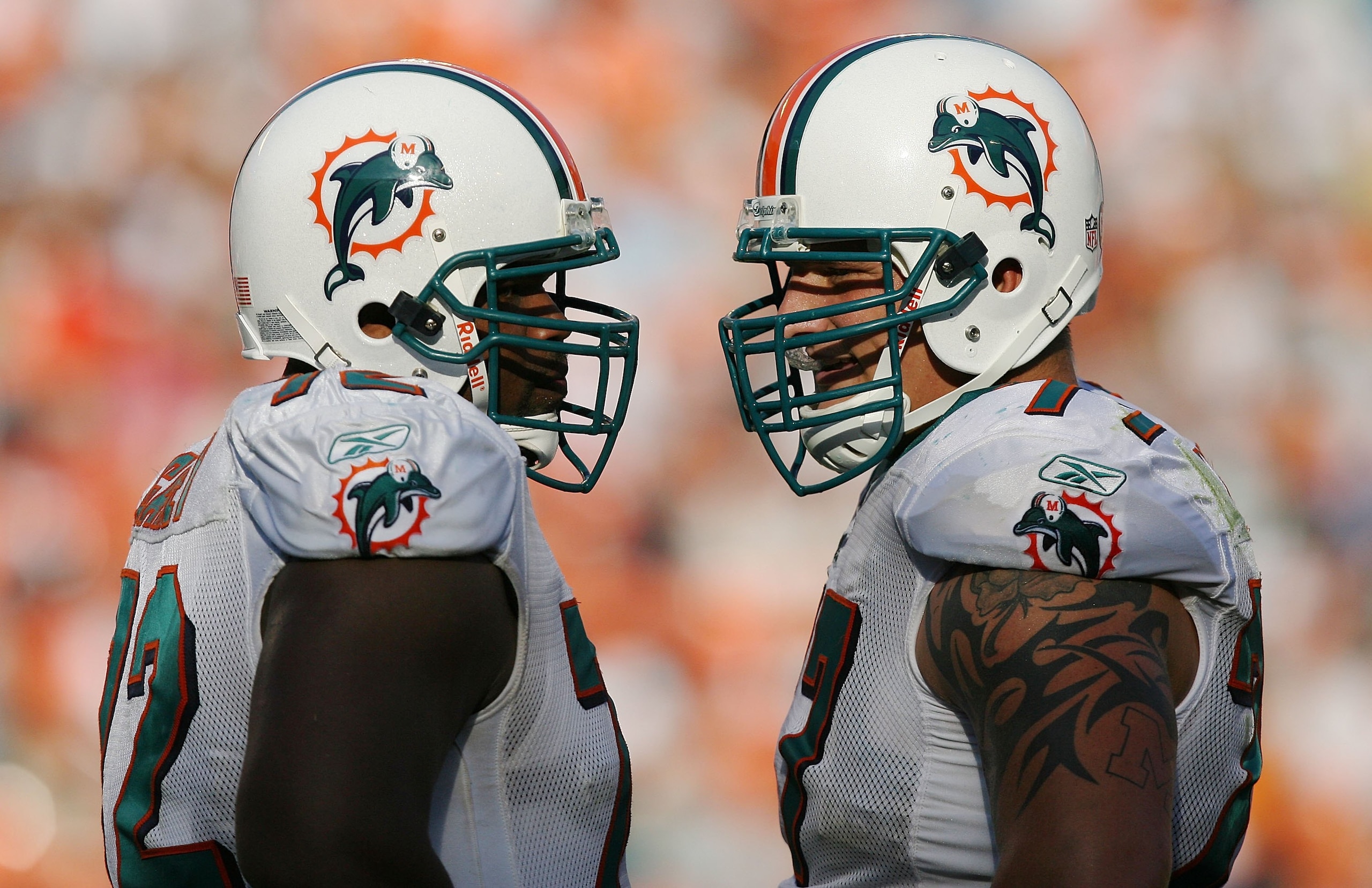 MIAMI - NOVEMBER 09: Offensive linemen Vernon Carey #72 and Jake Long #77 of the Miami Dolphins talk between plays while taking on the Seattle Seahawks at Dolphin Stadium on November 9, 2008 in Miami, Florida. The Dolphins defeated the Seahawks 21-19. ( MIAMI - NOVEMBER 09: Offensive linemen Vernon Carey #72 and Jake Long #77 of the Miami Dolphins talk between plays while taking on the Seattle Seahawks at Dolphin Stadium on November 9, 2008 in Miami, Florida. The Dolphins defeated the Seahawks 21-19. (