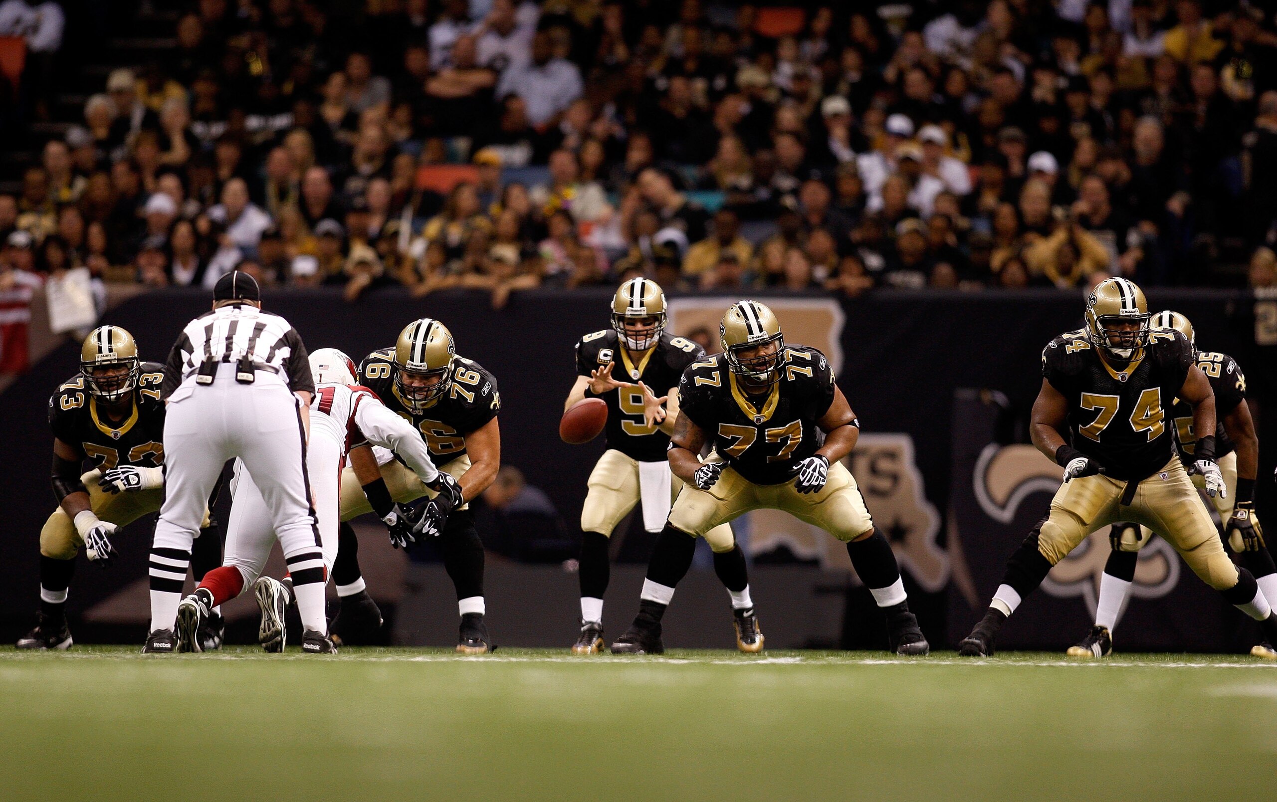 NEW ORLEANS - JANUARY 16: (L-R) Offensive lineman Jahri Evans #73, Jonathan Goodwin #76 Carl Nicks #77 and Jermon Bushrod #74 of the New Orleans Saints pass protect on the snap back to Drew Brees #9 against the Arizona Cardinals during the NFC Divisional NEW ORLEANS - JANUARY 16: (L-R) Offensive lineman Jahri Evans #73, Jonathan Goodwin #76 Carl Nicks #77 and Jermon Bushrod #74 of the New Orleans Saints pass protect on the snap back to Drew Brees #9 against the Arizona Cardinals during the NFC Divisional