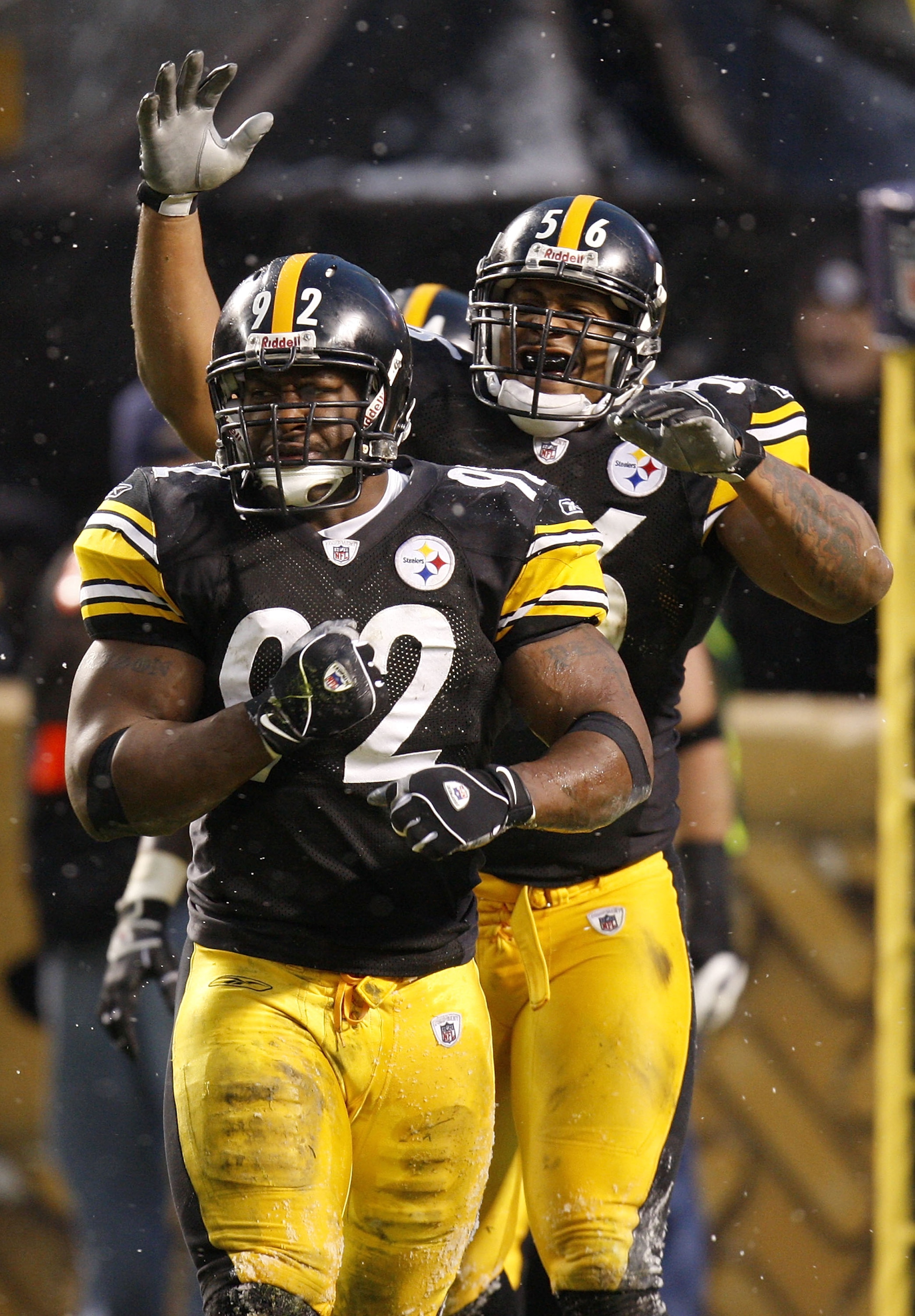 PITTSBURGH - NOVEMBER 16: James Harrison #92 of the Pittsburgh Steelers is congratulated by LaMarr Woodley #56 after a second quarter saftey while playing the San Diego Chargers on November 16, 2008 at Heinz Field in Pittsburgh, Pennsylvania. (Photo by PITTSBURGH - NOVEMBER 16: James Harrison #92 of the Pittsburgh Steelers is congratulated by LaMarr Woodley #56 after a second quarter saftey while playing the San Diego Chargers on November 16, 2008 at Heinz Field in Pittsburgh, Pennsylvania. (Photo by