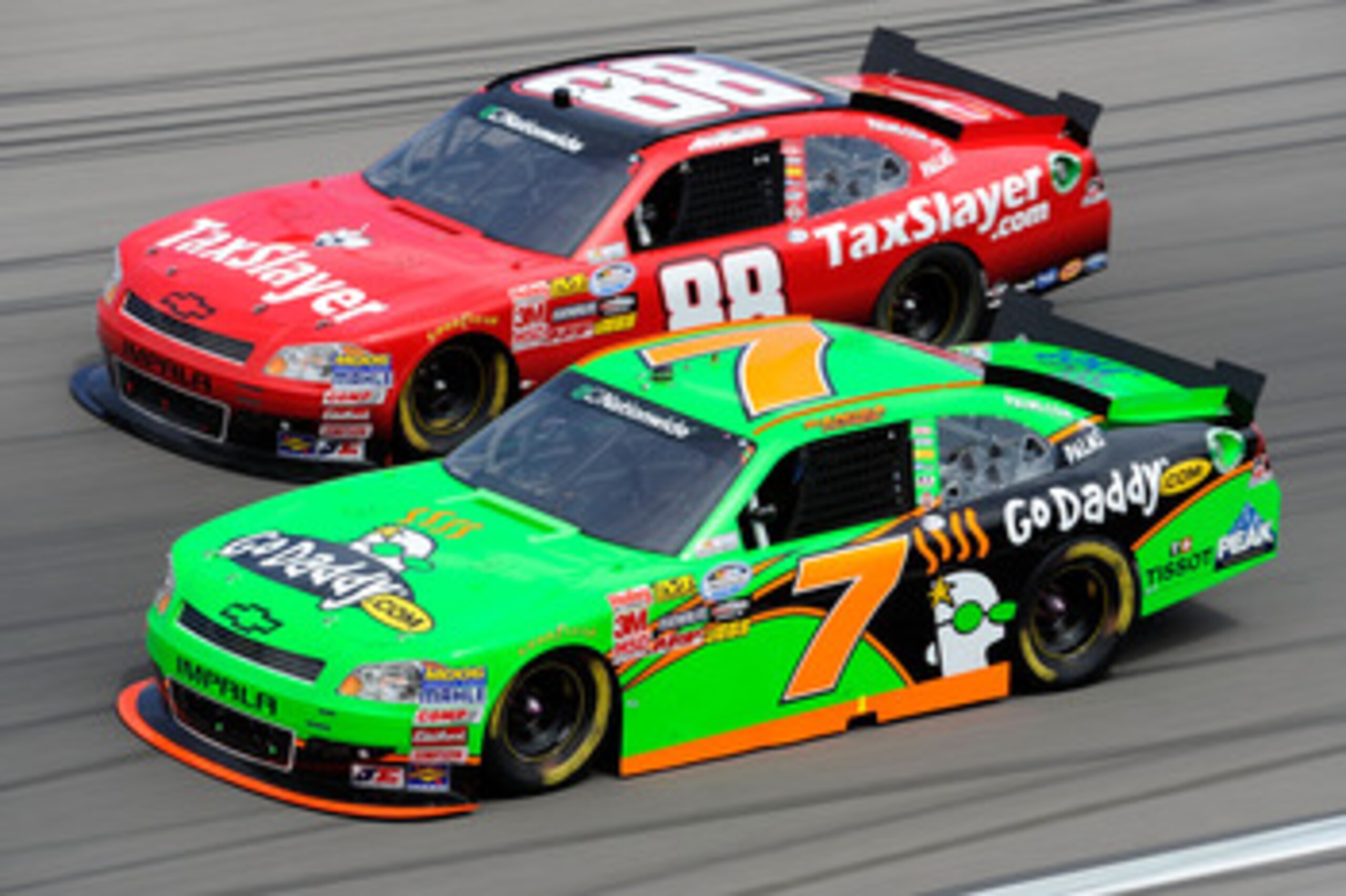 LAS VEGAS, NV - MARCH 05: Danica Patrick, driver of the #7 GoDaddy.com Chevrolet, races Aric Almirola, driver of the #88 TaxSlayer.com Chevrolet, during the NASCAR Nationwide Series Sam's Town 300 at Las Vegas Motor Speedway on March 5, 2011 in Las Vegas LAS VEGAS, NV - MARCH 05: Danica Patrick, driver of the #7 GoDaddy.com Chevrolet, races Aric Almirola, driver of the #88 TaxSlayer.com Chevrolet, during the NASCAR Nationwide Series Sam's Town 300 at Las Vegas Motor Speedway on March 5, 2011 in Las Vegas