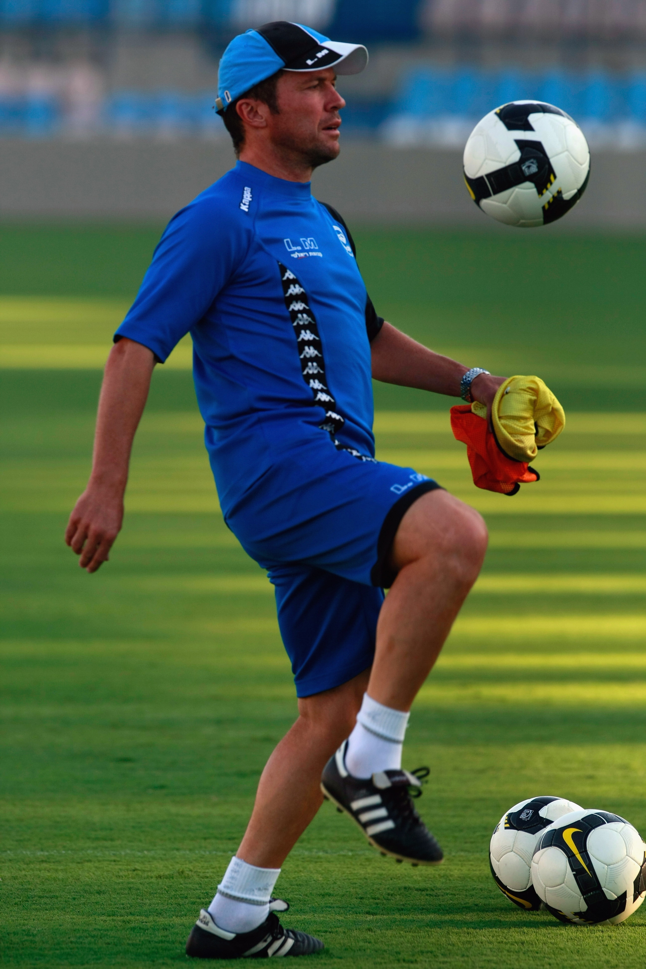 TEL AVIV, ISRAEL - AUGUST 13: Headcoach Lothar Matthaeus of Maccabi Netanya controls a ball at the team training a day ahead of their match against Cherno More, on August 13, 2008 in Tel Aviv, Israel. Matthaeus faces his 2008 UEFA Cup debut as Netanya coa