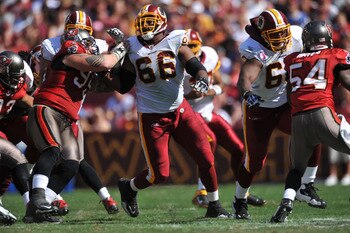 LANDOVER, MD - OCTOBER 4:  Derrick Dockery #66 of the Washington Redskins defends against the Tampa Bay Buccaneers at FedExField on October 4, 2009 in Landover, Maryland. The Redskins defeated the Buccaneers 16-13. (Photo by Larry French/Getty Images)