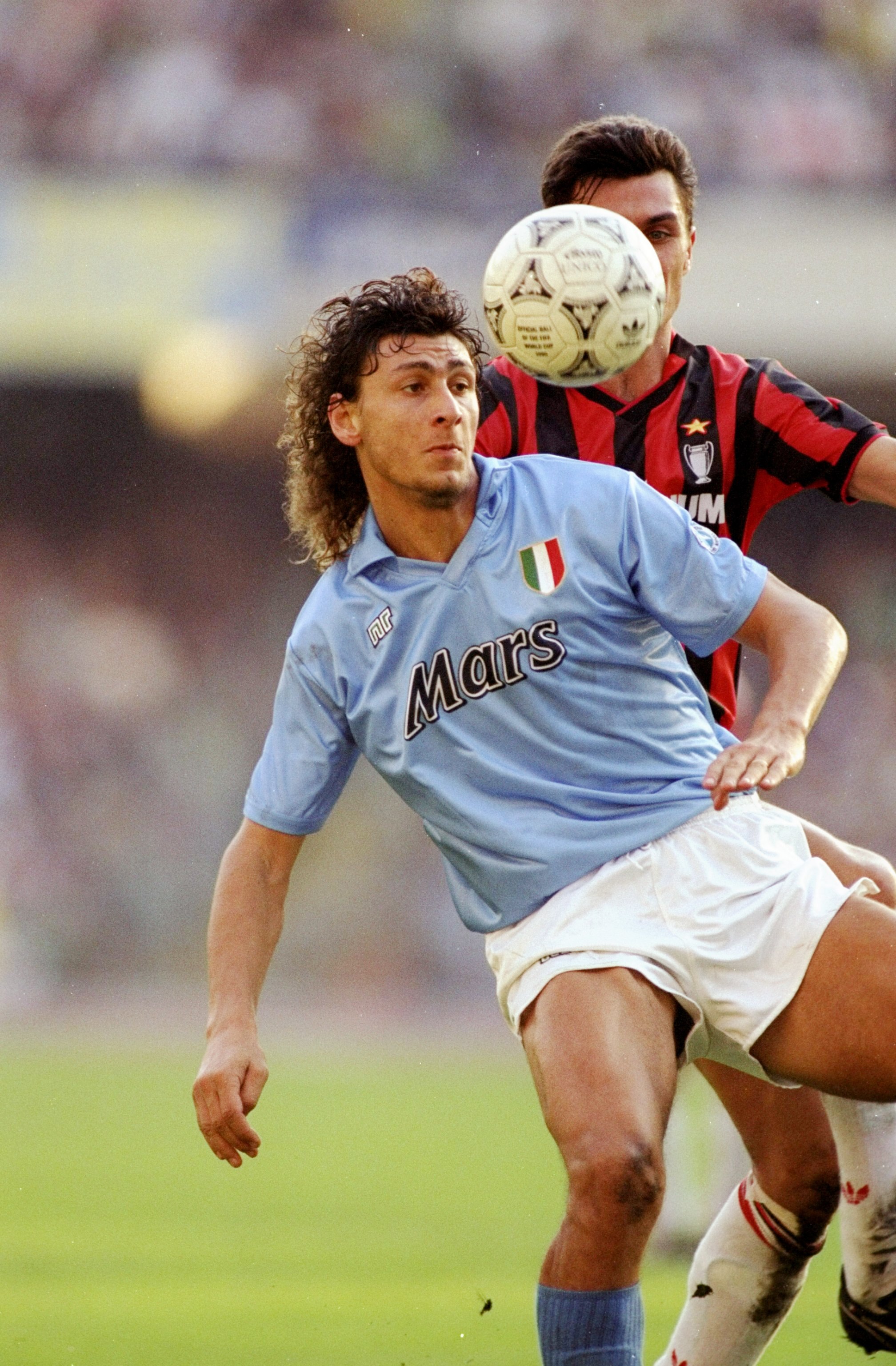21 Oct 1990:  Andrea Silenzi (front) of Napoli is shadowed by Paolo Maldini of AC Milan during an Italian League match at the San Paolo Stadium in Naples, Italy. The match ended in a 1-1 draw. \ Mandatory Credit: Simon  Bruty/Allsport