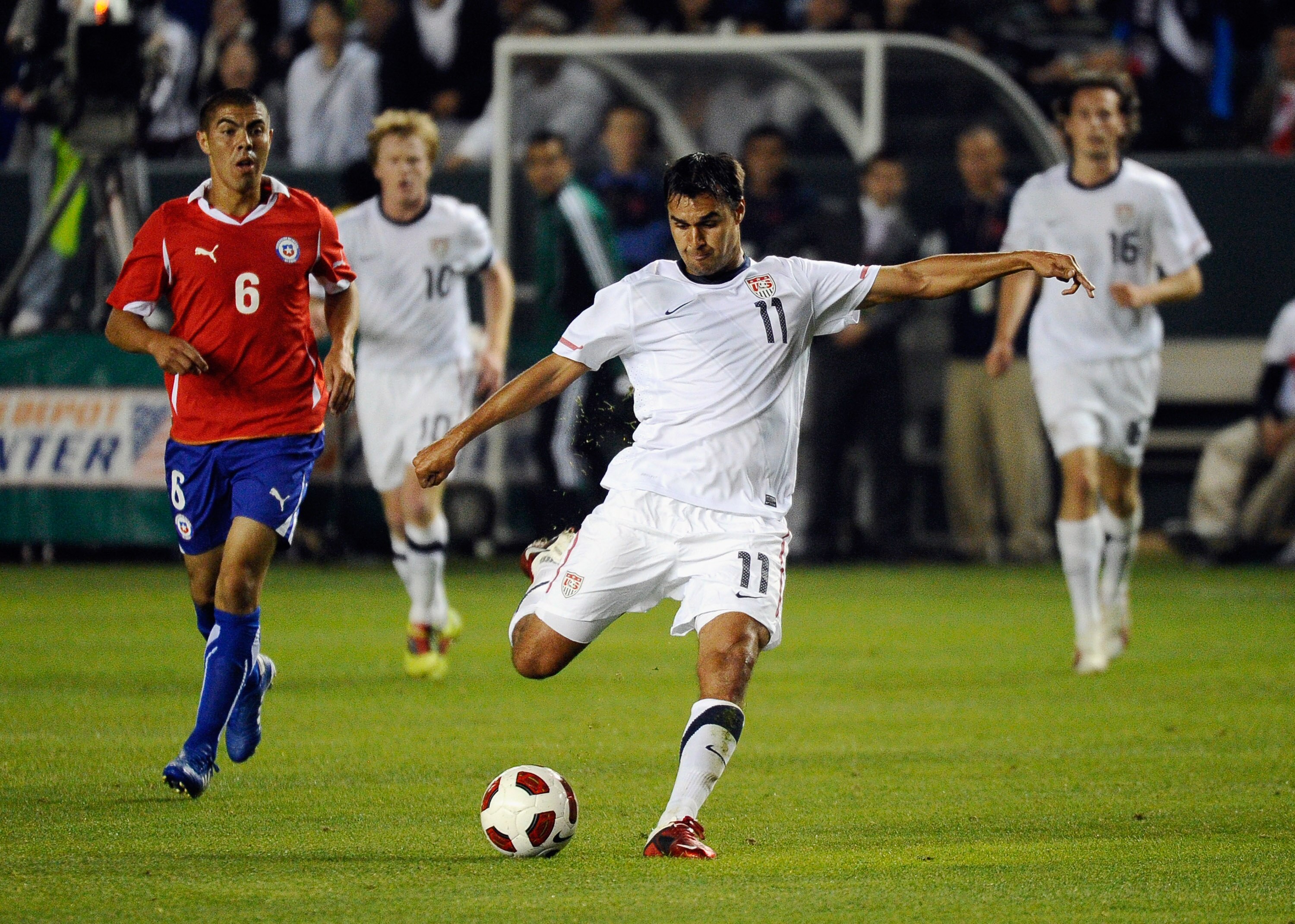 CARSON, CA - JANUARY 22:  Chris Wondolowski #11 of the United Statestakes a shot on goal against Francisco Silva #6 of Chile during the friendly soccer match at The Home Depot Center on January 22, 2011 in Carson, California.  (Photo by Kevork Djansezian/