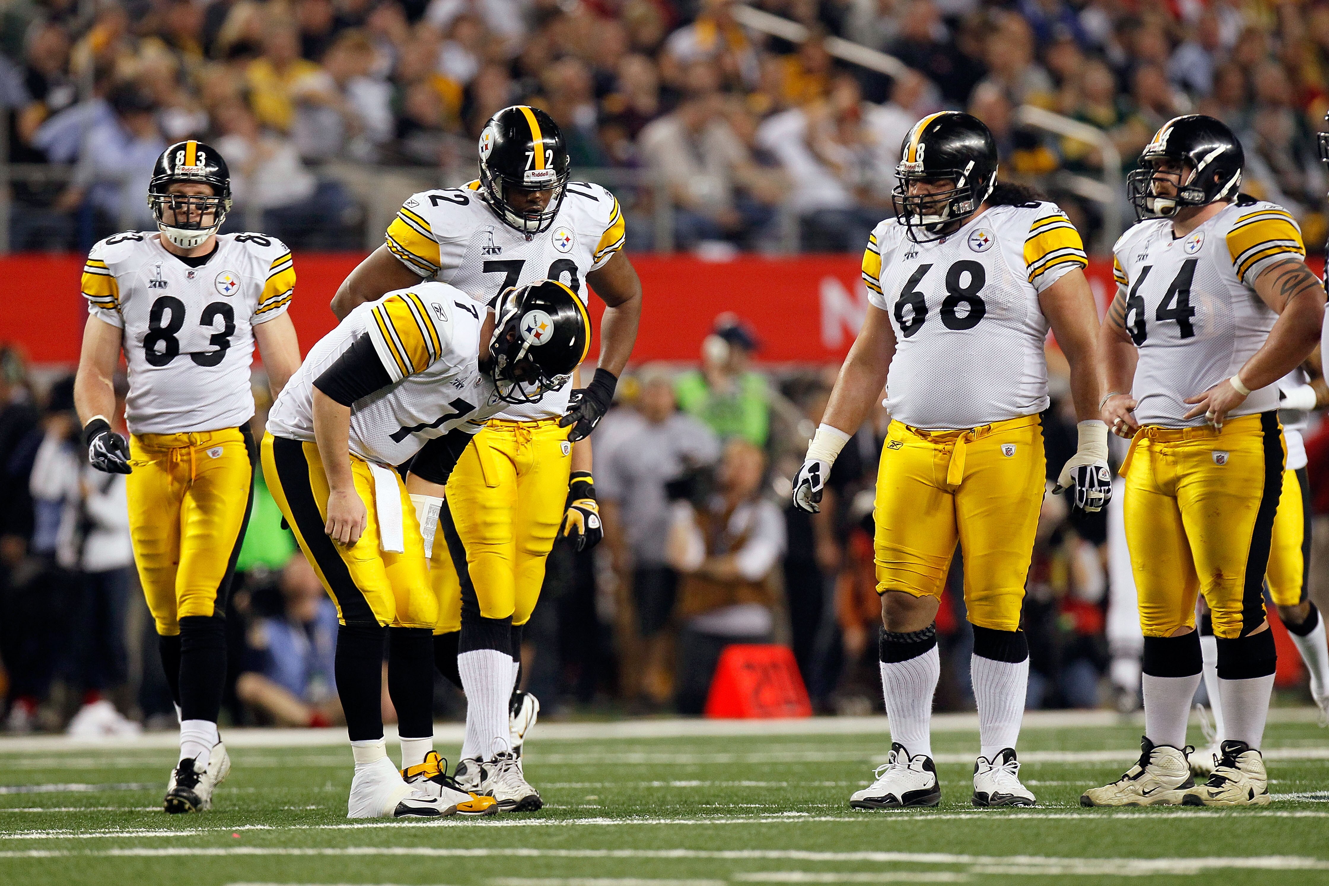 ARLINGTON, TX - FEBRUARY 06: Ben Roethlisberger #7 of the Pittsburgh Steelers grabs his leg after a play against the Green Bay Packers during Super Bowl XLV at Cowboys Stadium on February 6, 2011 in Arlington, Texas.  (Photo by Kevin C. Cox/Getty Images)