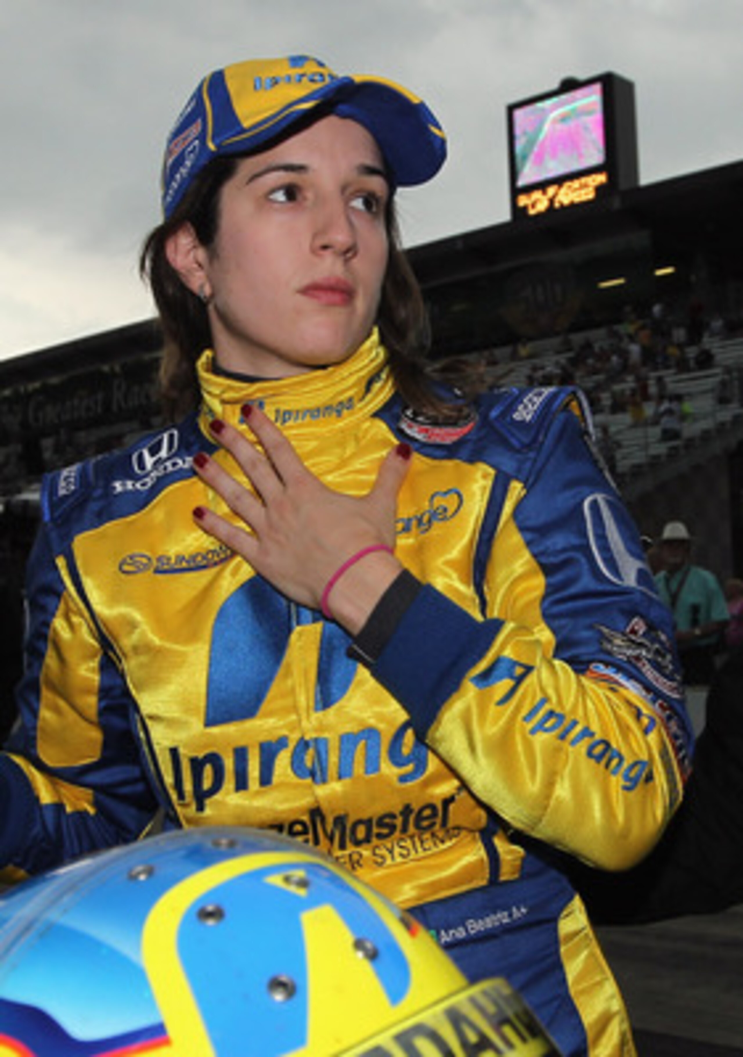 INDIANAPOLIS, IN - MAY 22:  Ana Beatriz of Brazil, driver of the #24 Team Ipiranga/Dreyer & Reinbold Racing Dallara Honda, looks to the scoreboard after qualifying for the Indianapolis 500 on May 22, 2011 at Indianapolis Motor Speedway in Indianapolis, In