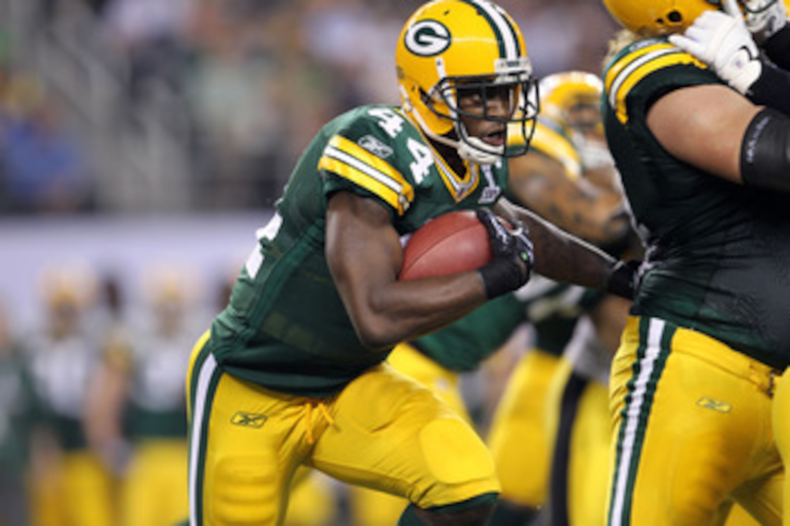 ARLINGTON, TX - FEBRUARY 06:  James Starks #44 of the Green Bay Packers runs the ball against the Pittsburgh Steelers during Super Bowl XLV at Cowboys Stadium on February 6, 2011 in Arlington, Texas. The Packers won 31-25. (Photo by Jamie Squire/Getty Ima