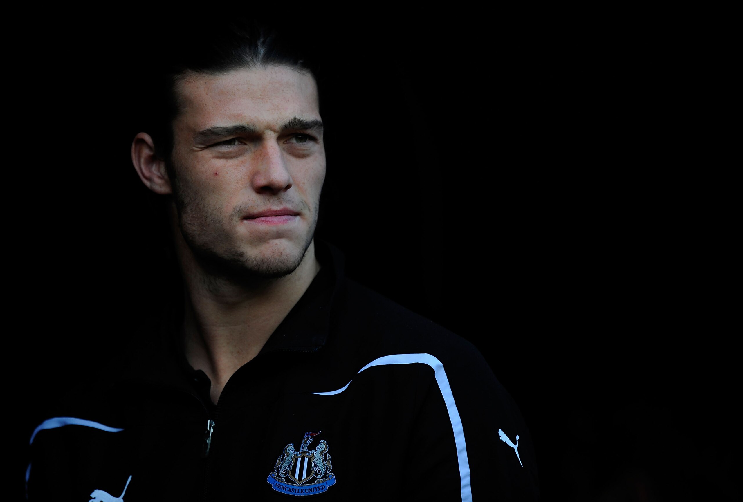 SUNDERLAND, ENGLAND - JANUARY 16:  Newcastle player Andy Carroll looks on from the tunnel before the Barclays Premier League match between Sunderland and Newcastle United at Stadium of Light on January 16, 2011 in Sunderland, England.  (Photo by Stu Forst