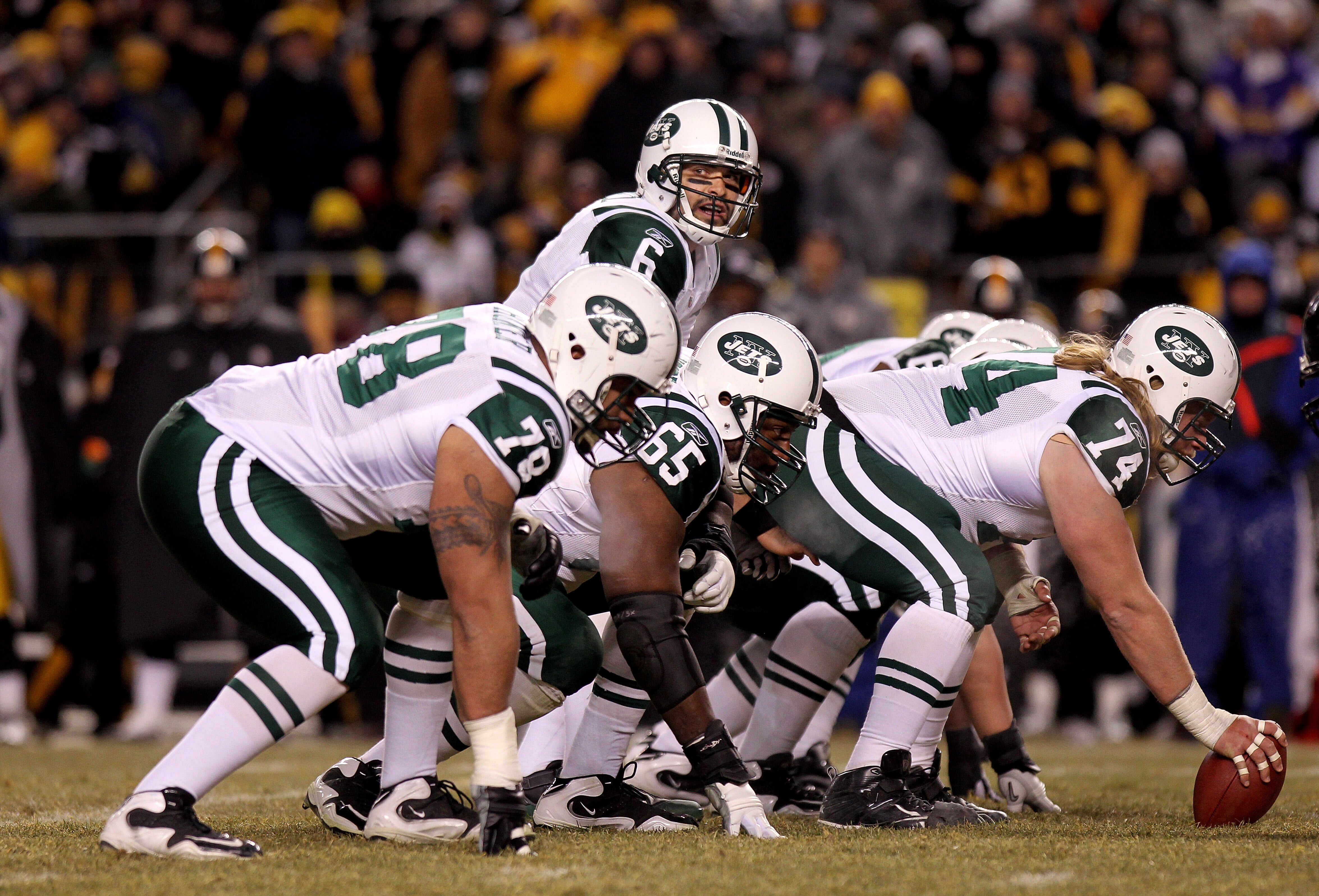 PITTSBURGH, PA - JANUARY 23:  Quarterback Mark Sanchez #6 of the New York Jets calls signals at the line of scgimmage behind Wayne Hunter #78, Brandon Moore #65 and center Nick Mangold #74 against the Pittsburgh Steelers during the 2011 AFC Championship g