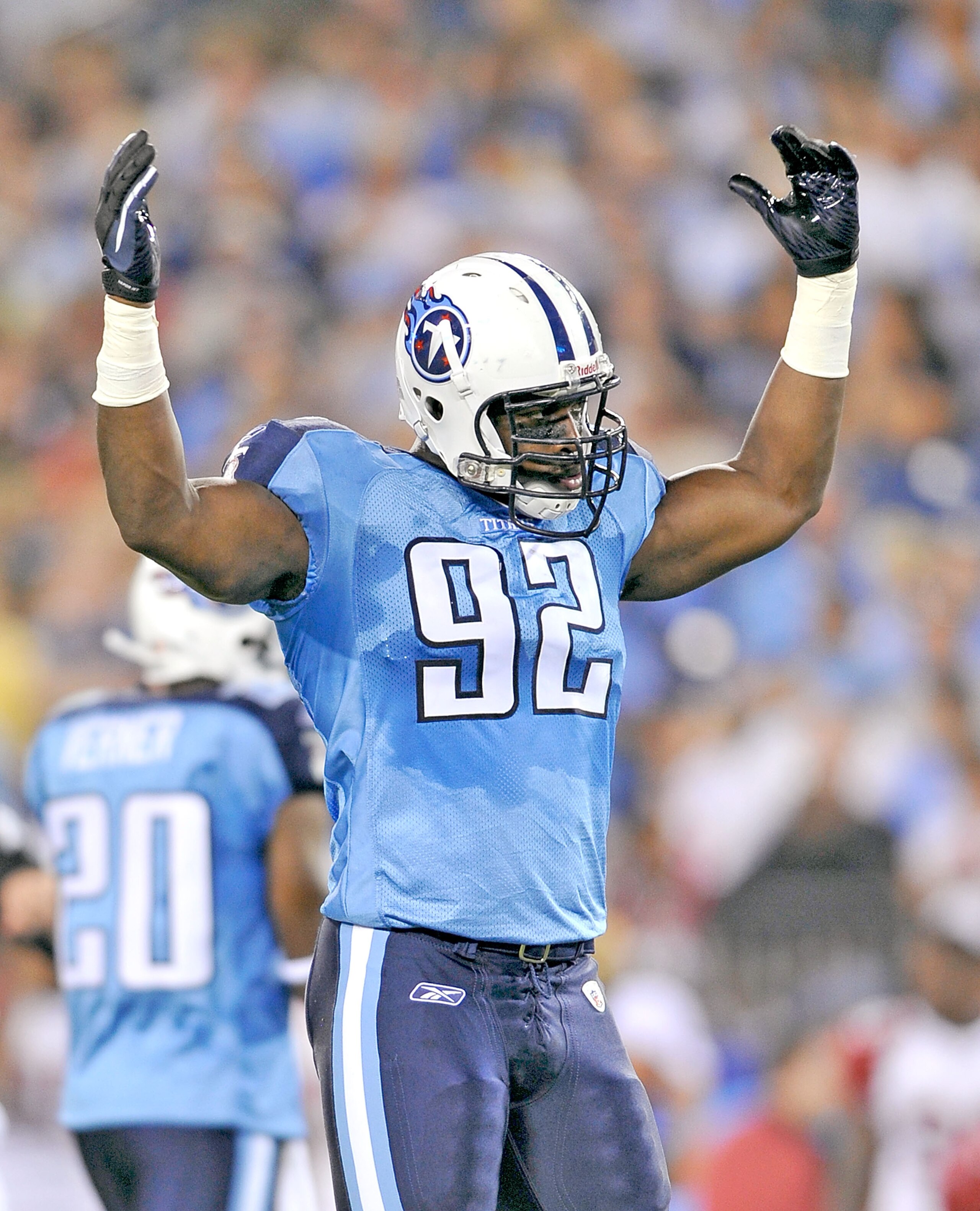 NASHVILLE, TN - AUGUST 23:  Will Witherspoon #92 of the Tennessee Titans encourages the home crowd to make some noise during a preseason game against the Arizona Cardinals at LP Field on August 23, 2010 in Nashville, Tennessee.  (Photo by Grant Halverson/