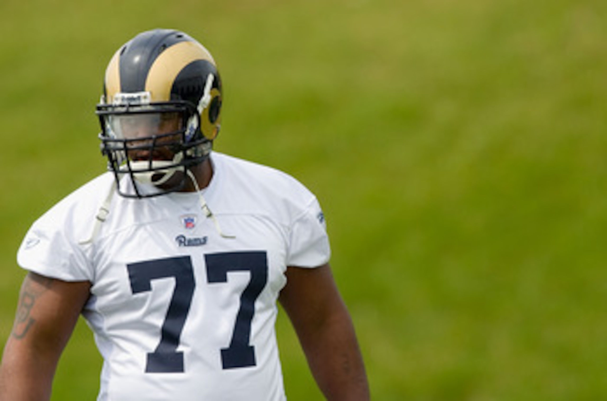 EARTH CITY, MO - MAY 2: Jason Smith #77 of the St. Louis Rams looks on during a mini camp on May 2, 2009 at the Russell Training Center in Earth City, Missouri.  (Dilip Vishwanat/Getty Images)