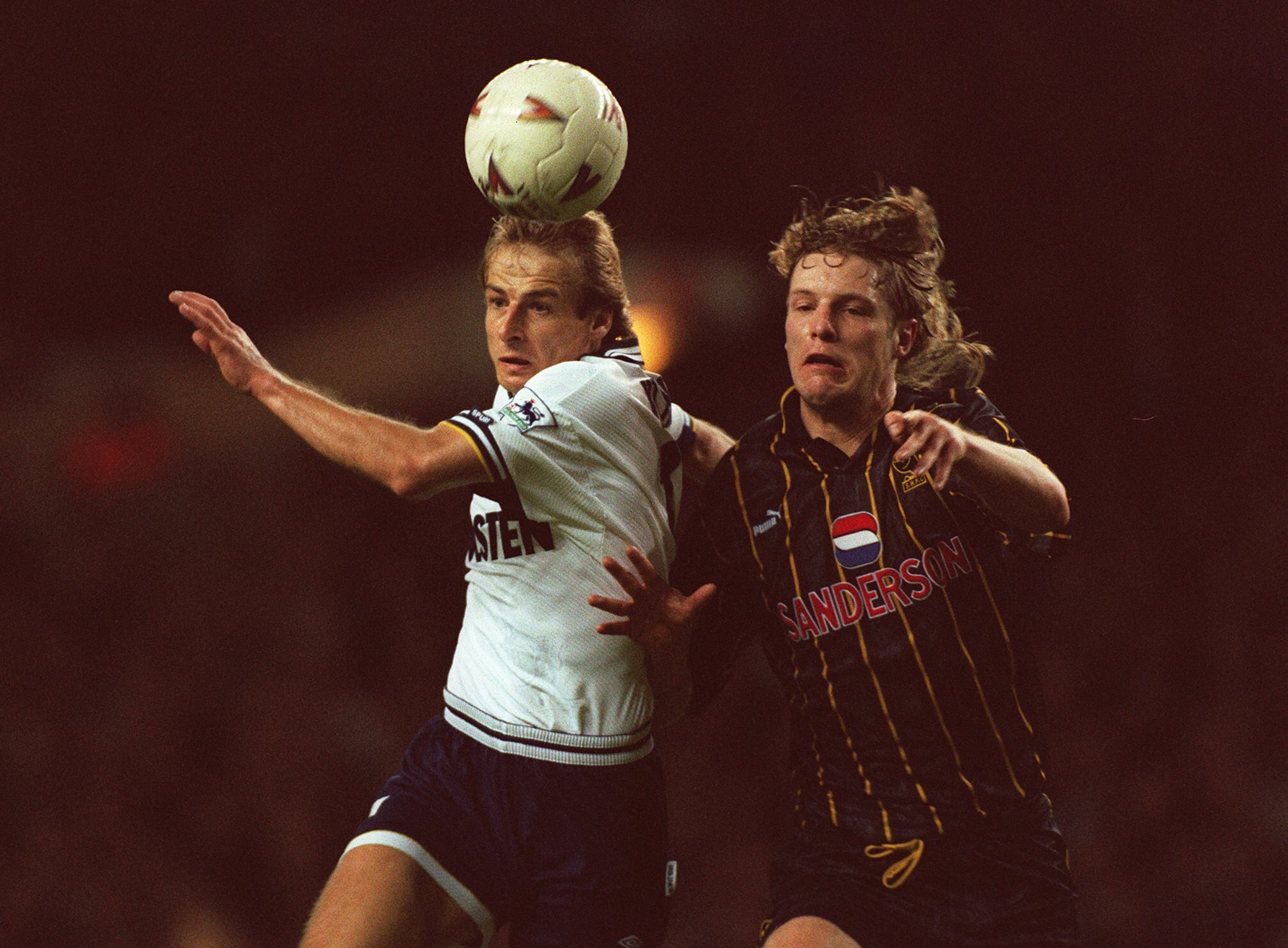 10 DEC 1994:  JURGEN KLINSMANN OF TOTTENHAM BEATS ANDY PEARCE OF SHEFFIELD WEDNESDAY TO SCORE IN THEIR FA PREMIERSHIP MATCH TODAY. TOTTENHAM HOTSPURS WON THE MATCH 3-1. PHOTO: MIKE COOPER/ALLSPORT. Mandatory Credit: Mike Cooper/ALLSPORT
