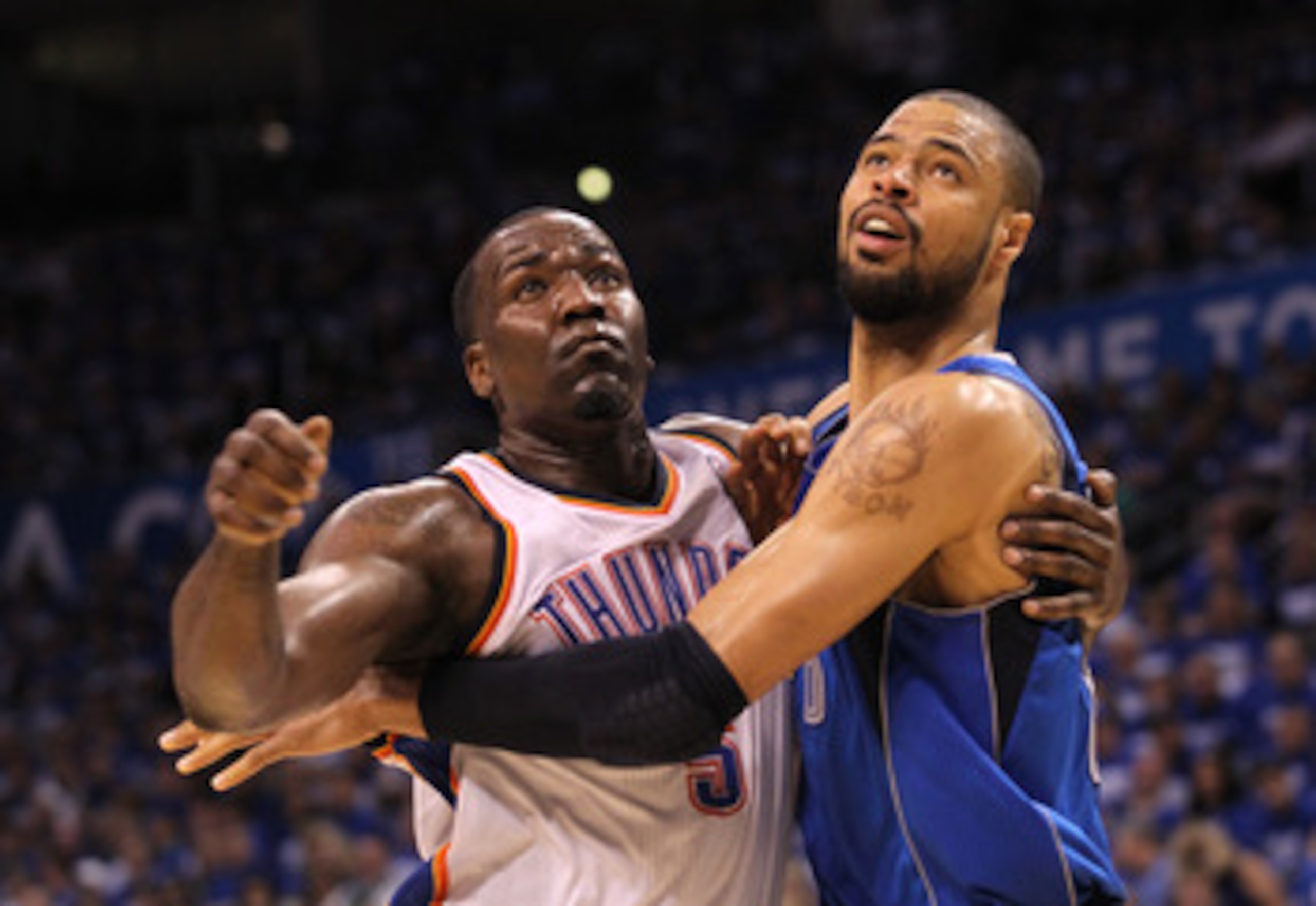 OKLAHOMA CITY, OK - MAY 21:  Kendrick Perkins #5 of the Oklahoma City Thunder and Tyson Chandler #6 of the Dallas Mavericks battle for position in Game Three of the Western Conference Finals during the 2011 NBA Playoffs at Oklahoma City Arena on May 21, 2