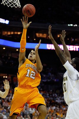 CHARLOTTE, NC - MARCH 18: Tobias Harris #12 of the Tennessee Volunteers shoots over Tim Hardaway Jr. #10 of the Michigan Wolverines in the first half during the second round of the 2011 NCAA men's basketball tournament at Time Warner Cable Arena on March CHARLOTTE, NC - MARCH 18: Tobias Harris #12 of the Tennessee Volunteers shoots over Tim Hardaway Jr. #10 of the Michigan Wolverines in the first half during the second round of the 2011 NCAA men's basketball tournament at Time Warner Cable Arena on March