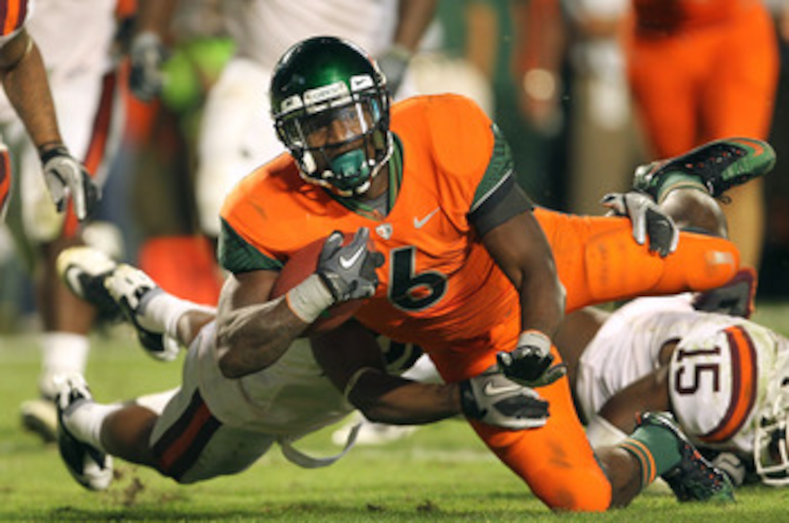 MIAMI - NOVEMBER 20:  Lamar Miller #6 of the Miami Hurricanes runs for a touchdown during a game against the Virginia Tech Hokies at Sun Life Stadium on November 20, 2010 in Miami, Florida.  (Photo by Mike Ehrmann/Getty Images)