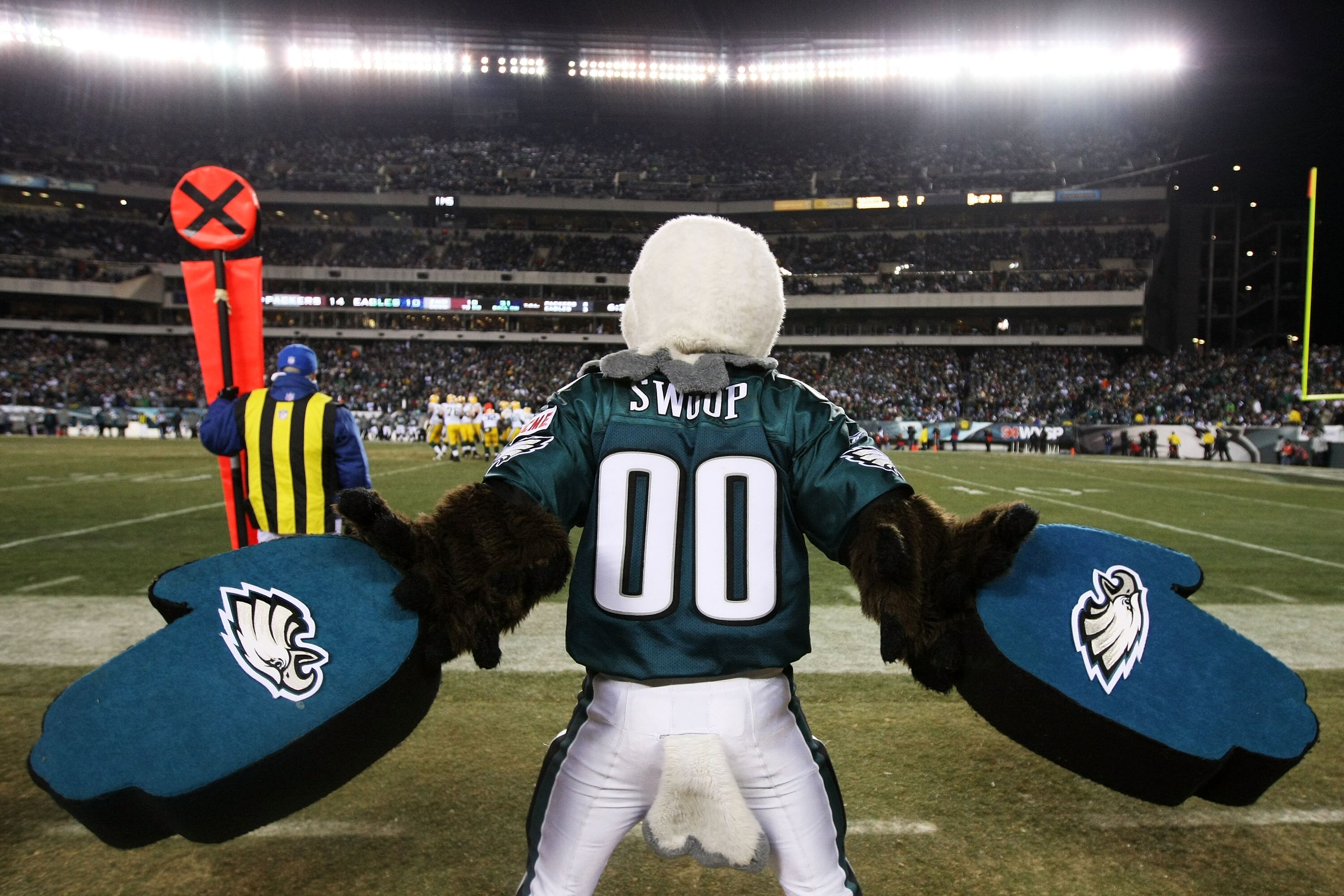 PHILADELPHIA, PA - JANUARY 09:  Philadelphia Eagles mascot Swoop cheers on the sidelines against the Green Bay Packers during the 2011 NFC wild card playoff game at Lincoln Financial Field on January 9, 2011 in Philadelphia, Pennsylvania.  (Photo by Al Be