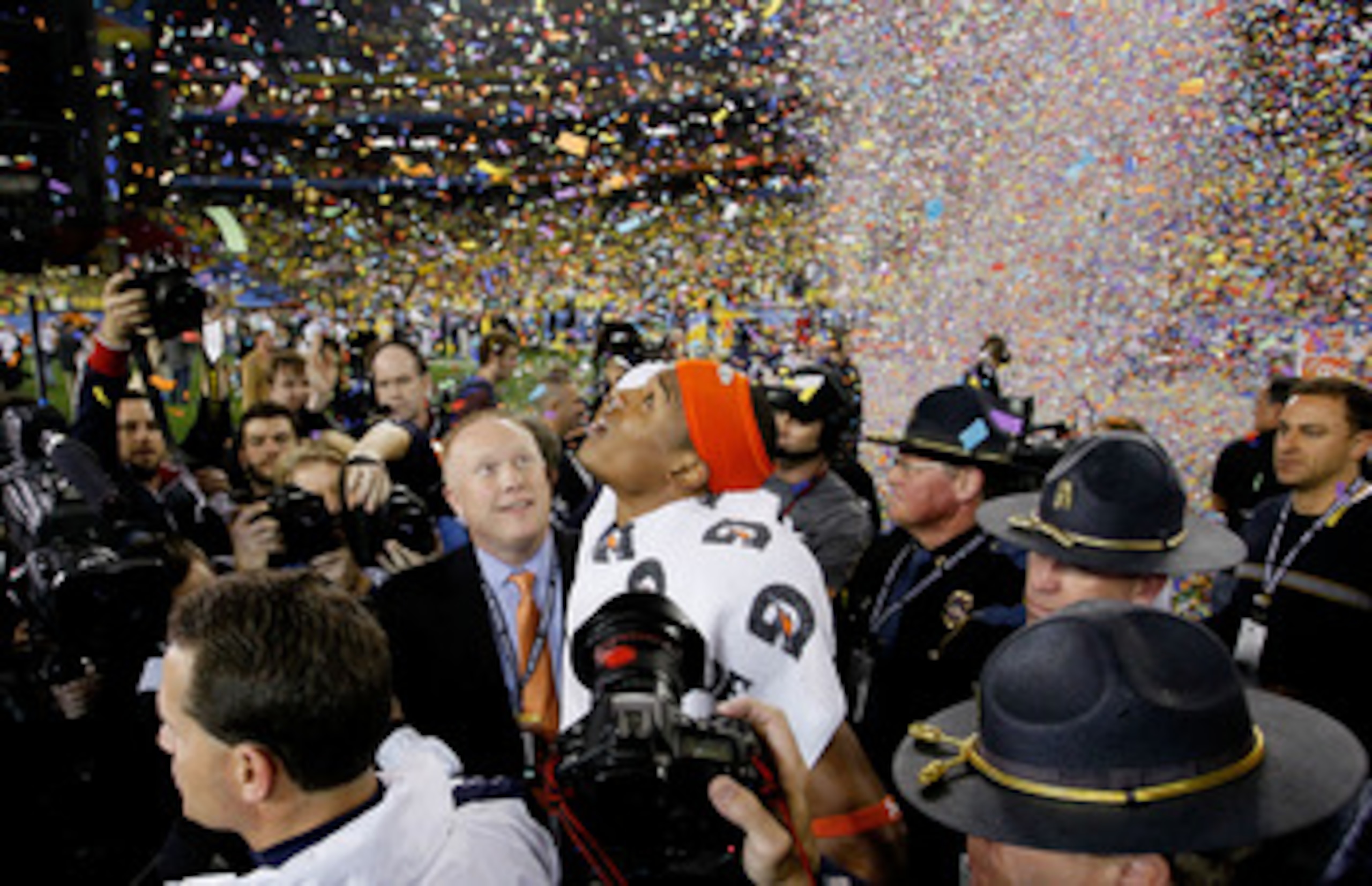 GLENDALE, AZ - JANUARY 10:  Quarterback Cameron Newton #2 of the Auburn Tigers celebrates the Tigers 22-19 victory against the Oregon Ducks in the Tostitos BCS National Championship Game at University of Phoenix Stadium on January 10, 2011 in Glendale, Ar