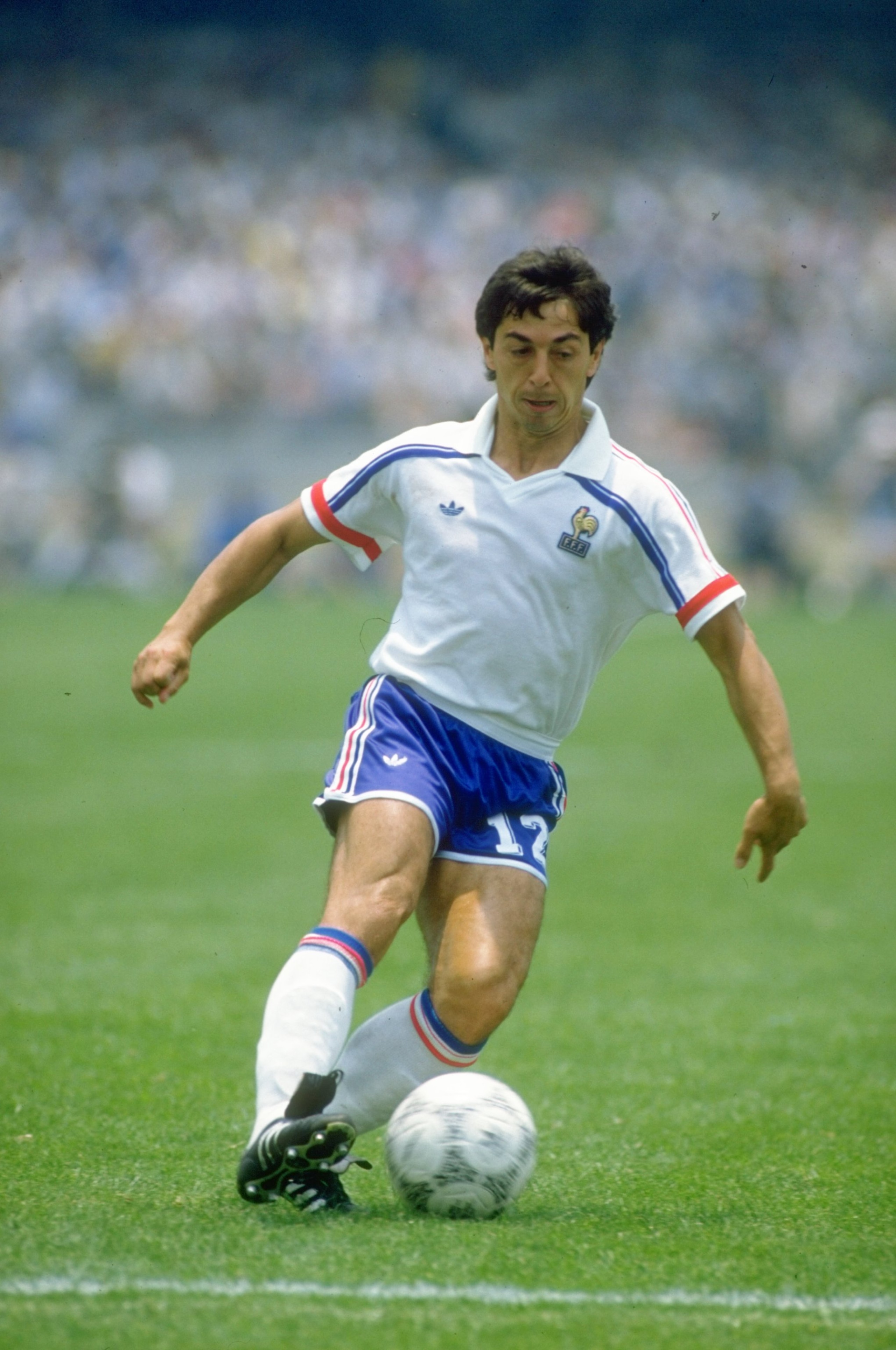 17 Jun 1986:  Alain Giresse of France in action during the World Cup match against Italy at the Olympic Stadium in Mexico City. France won the match 2-0. \ Mandatory Credit: David  Cannon/Allsport