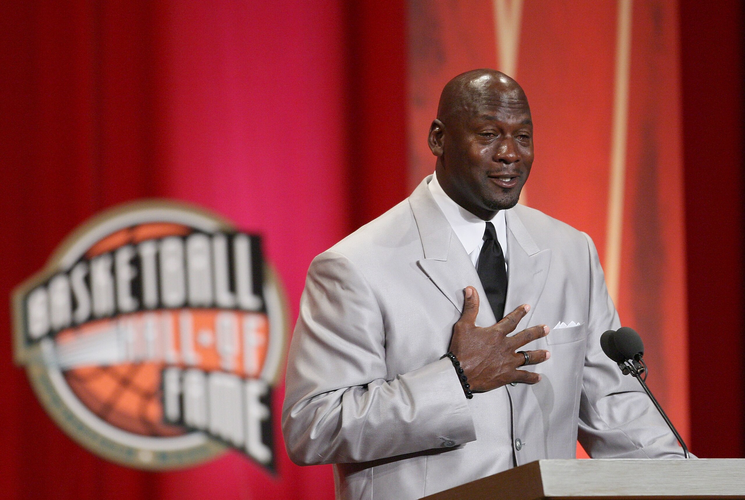 SPRINGFIELD, MA - SEPTEMBER 11: Michael Jordan reacts during his induction into the Naismith Memorial Basketball Hall of Fame on September 11, 2009 in Springfield, Massachusetts. NOTE TO USER: User expressly acknowledges and agrees that, by downloading an