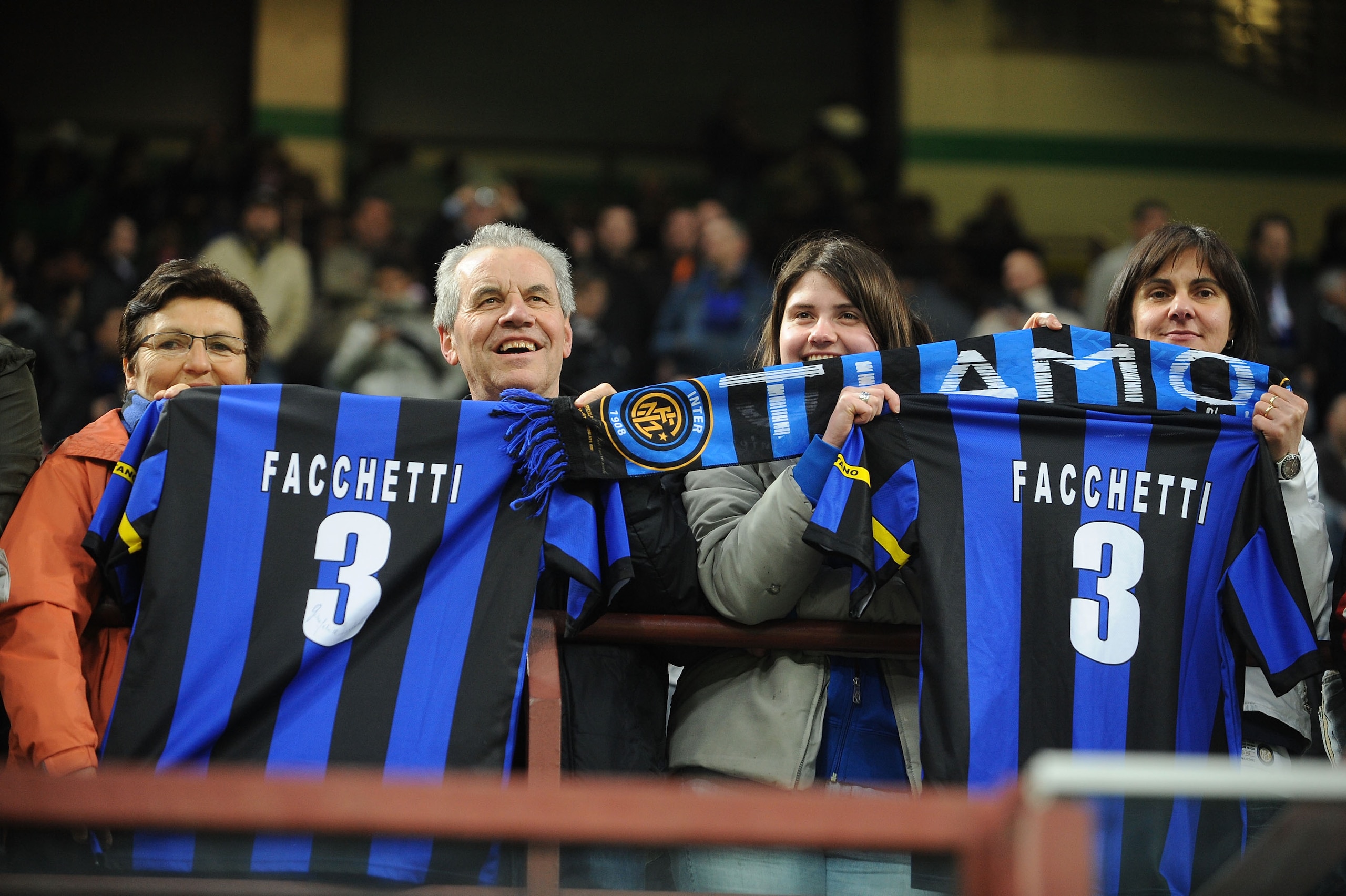 MILAN, ITALY - APRIL 16: Fans of FC Internazionale MIlano hold up shirts of former player Giacinto Facchetti, during the Serie A match between FC Internazionale Milano and Juventus FC at Stadio Giuseppe Meazza on April 16, 2010 in Milan, Italy.  (Photo by