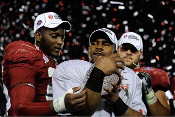 PASADENA, CA - JANUARY 07:  Running back Mark Ingram #22 of the Alabama Crimson Tide celebrates with the BCS Championship trophy after winning the Citi BCS National Championship game over the Texas Longhorns at the Rose Bowl on January 7, 2010 in Pasadena