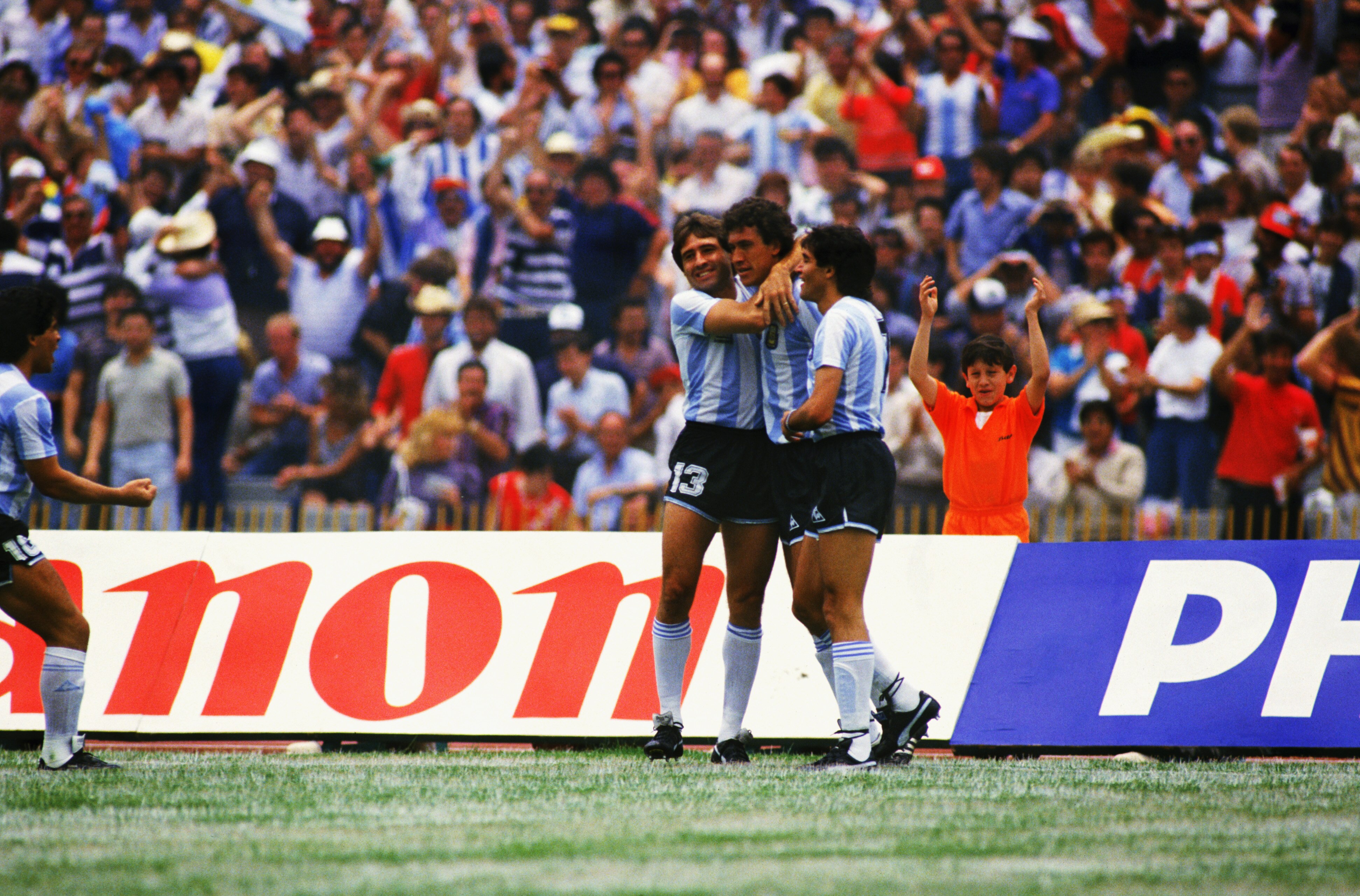 MEXICO CITY - JUNE 10:  Argentina players Oscar Garre (left) and Jose Burruchaga (right) congratulate goalscorer Jorge Valdano (centre) after he scored the opening goal of the match during the FIFA World Cup Finals 1986 Group A match between Argentina and