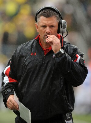 EUGENE, OR - SEPTEMBER 19:  Head coach Kyle Whittingham of the Utah Utes works the sidelines in the third quarter of the game against the Oregon Ducks at Autzen Stadium on September 19, 2009 in Eugene, Oregon. Oregon won the game 31-24. (Photo by Steve Dy