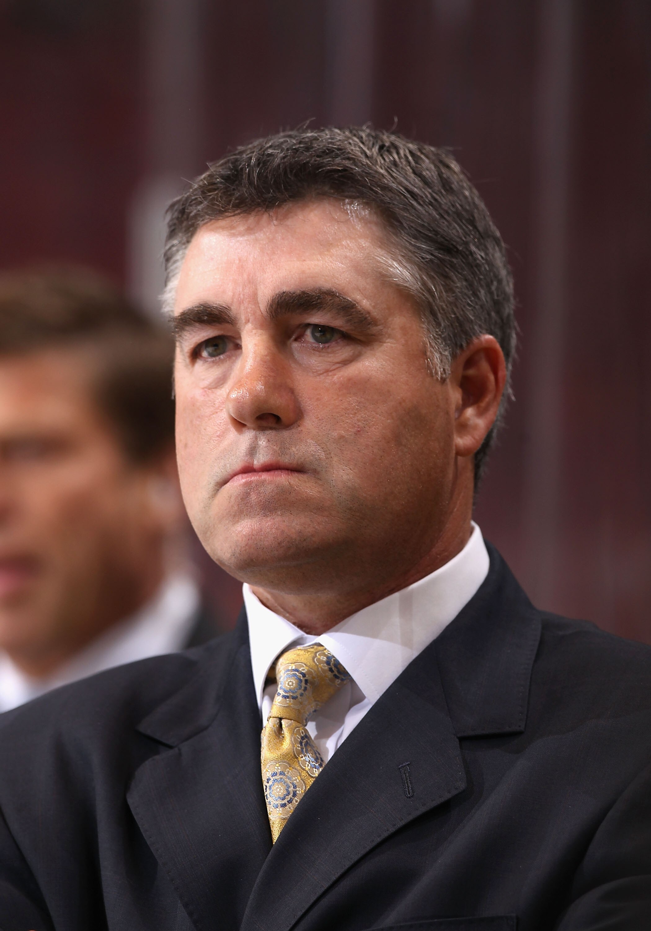 GLENDALE, AZ - MARCH 24:  Head coach  Dave Tippett of the Phoenix Coyotes watches from the bench during the NHL game against the Columbus Blue Jackets at Jobing.com Arena on March 24, 2011 in Glendale, Arizona. The Coyotes defeated the Blue Jackets 3-0.