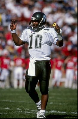24 Oct 1998: Shaun King #10 of Tulane raises his hands to celebrate during the game against Rutgers at Rutgers Stadium in New Brunswick, New Jersey. Tulane defeated Rutgers 52-24. Mandatory Credit: Ezra O. Shaw  /Allsport
