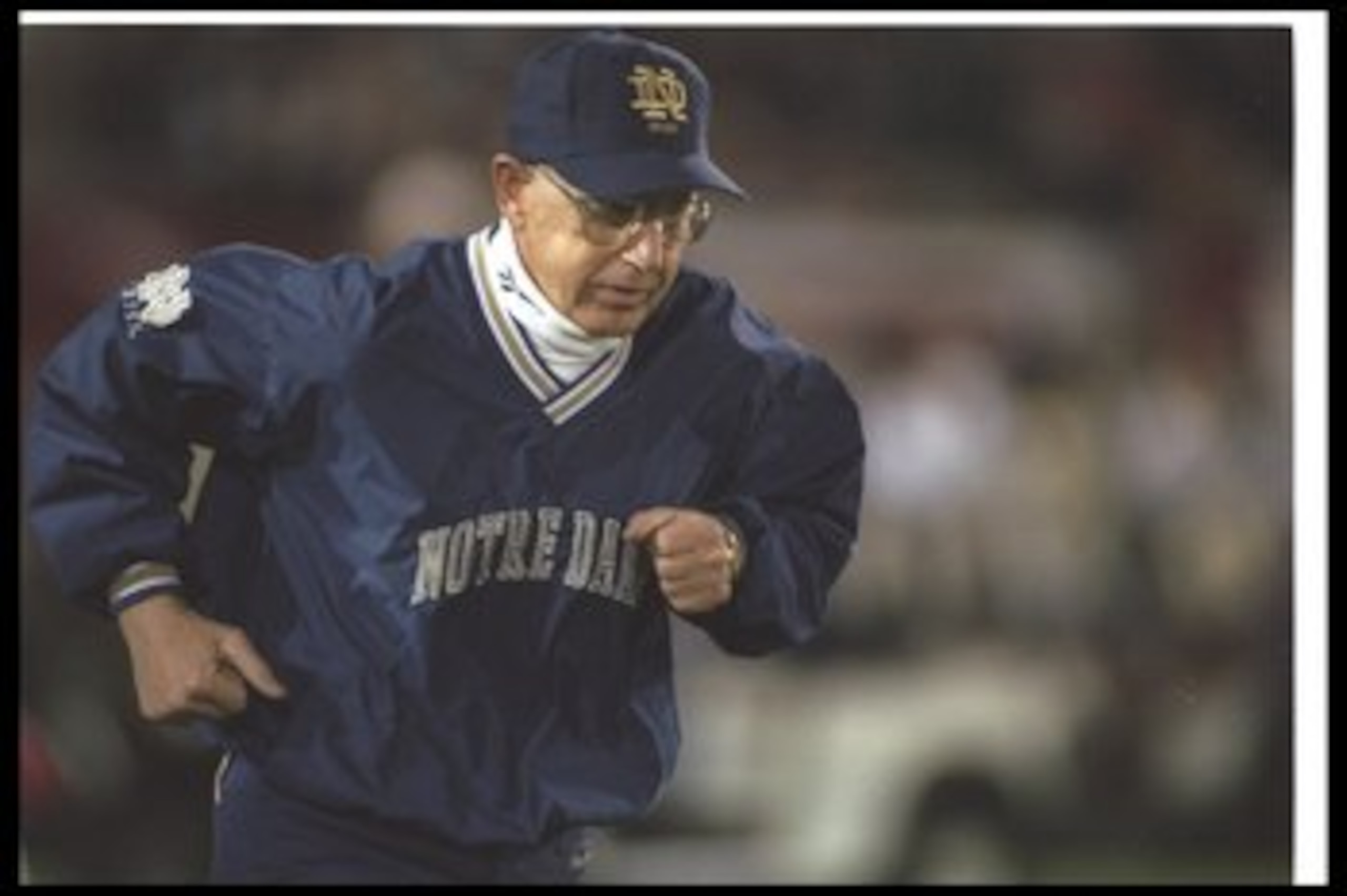 30 Nov 1996: Notre Dame Fighting Irish head coach Lou Holtz looks on during a game against the USC Trojans at the Coliseum in Los Angeles, California. USC won the game, 27-20.