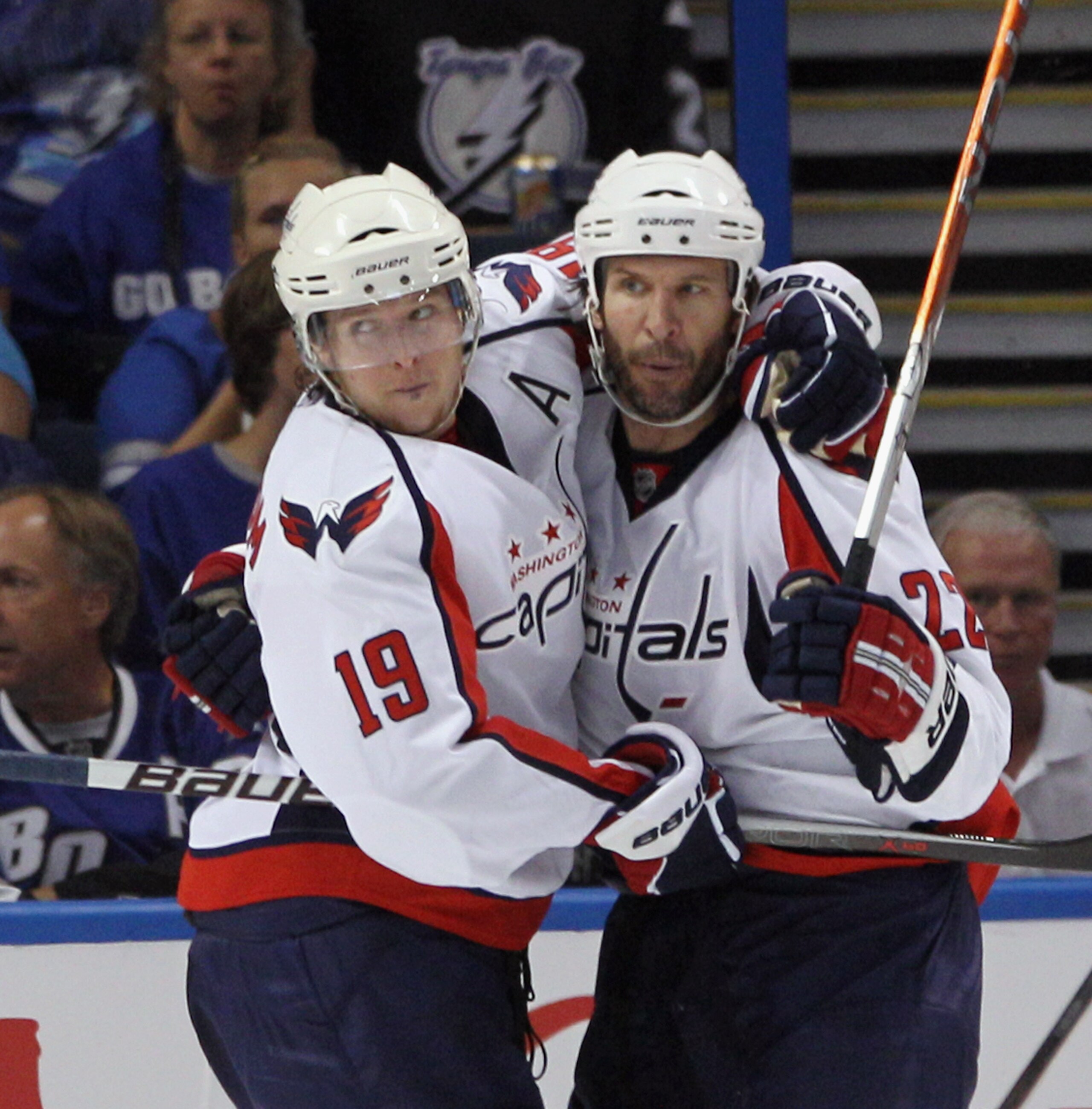 TAMPA, FL - MAY 03: Mike Knuble #22 of the Washington Capitals (R) scores at 59 seconds of the second period against the Tampa Bay Lightning and is hugged by Nicklas Backstrom #19 (L) in Game Three of the Eastern Conference Semifinals during the 2011 NHL