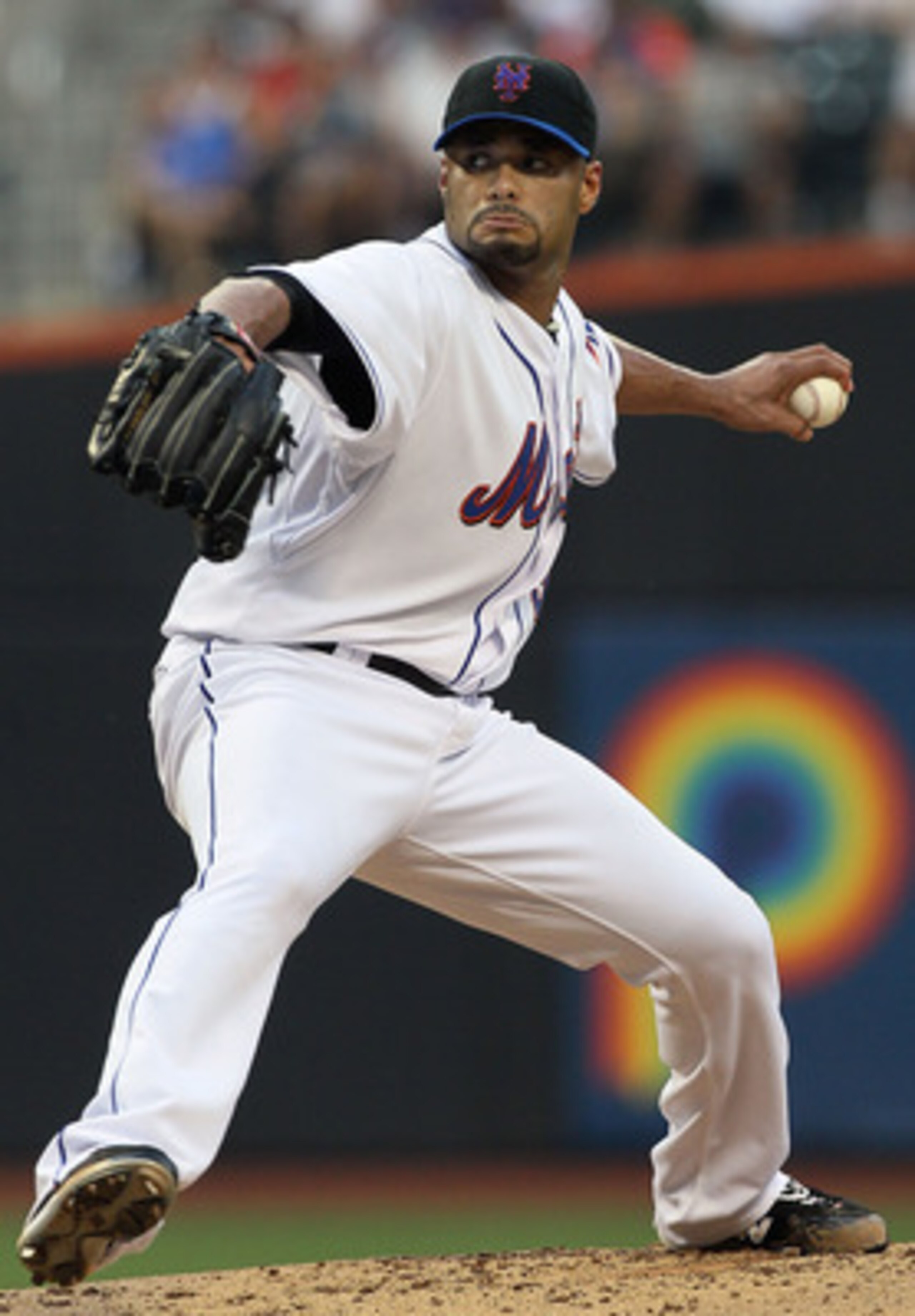 NEW YORK - JULY 06: Johan Santana #57 of the New York Mets delivers a pitch against the Cincinnati Reds on July 6, 2010 at Citi Field in the Flushing neighborhood of the Queens borough of New York City. (Photo by Jim McIsaac/Getty Images) NEW YORK - JULY 06: Johan Santana #57 of the New York Mets delivers a pitch against the Cincinnati Reds on July 6, 2010 at Citi Field in the Flushing neighborhood of the Queens borough of New York City. (Photo by Jim McIsaac/Getty Images)