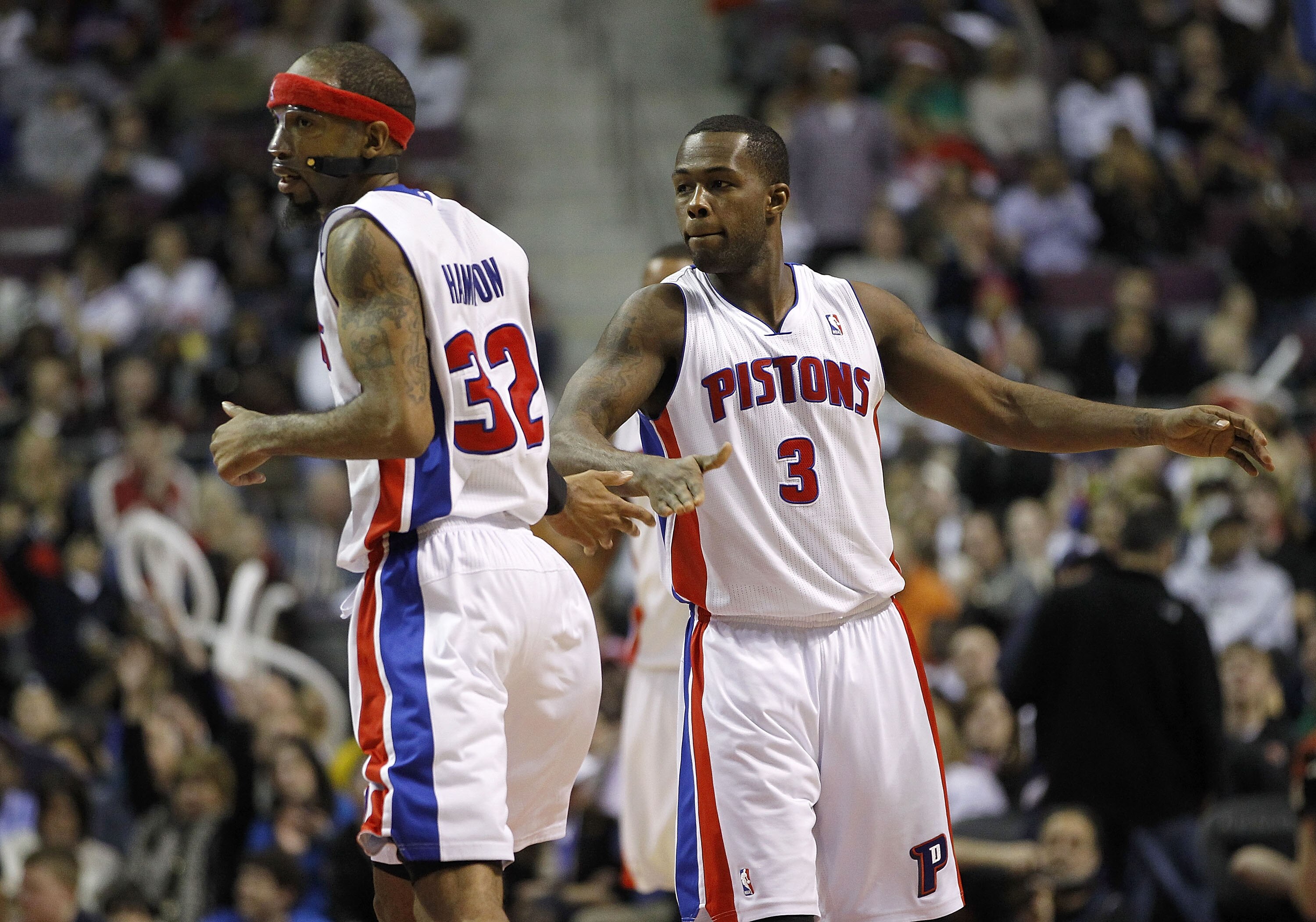 AUBURN HILLS, MI - MARCH 23: Richard Hamilton #32 of the Detroit Pistons celebrates a three-point basket with teammate Rodney Stuckey #3 while playing the Miami Heat at The Palace of Auburn Hills on March 23, 2011 in Auburn Hills, Michigan. Miami won the AUBURN HILLS, MI - MARCH 23: Richard Hamilton #32 of the Detroit Pistons celebrates a three-point basket with teammate Rodney Stuckey #3 while playing the Miami Heat at The Palace of Auburn Hills on March 23, 2011 in Auburn Hills, Michigan. Miami won the
