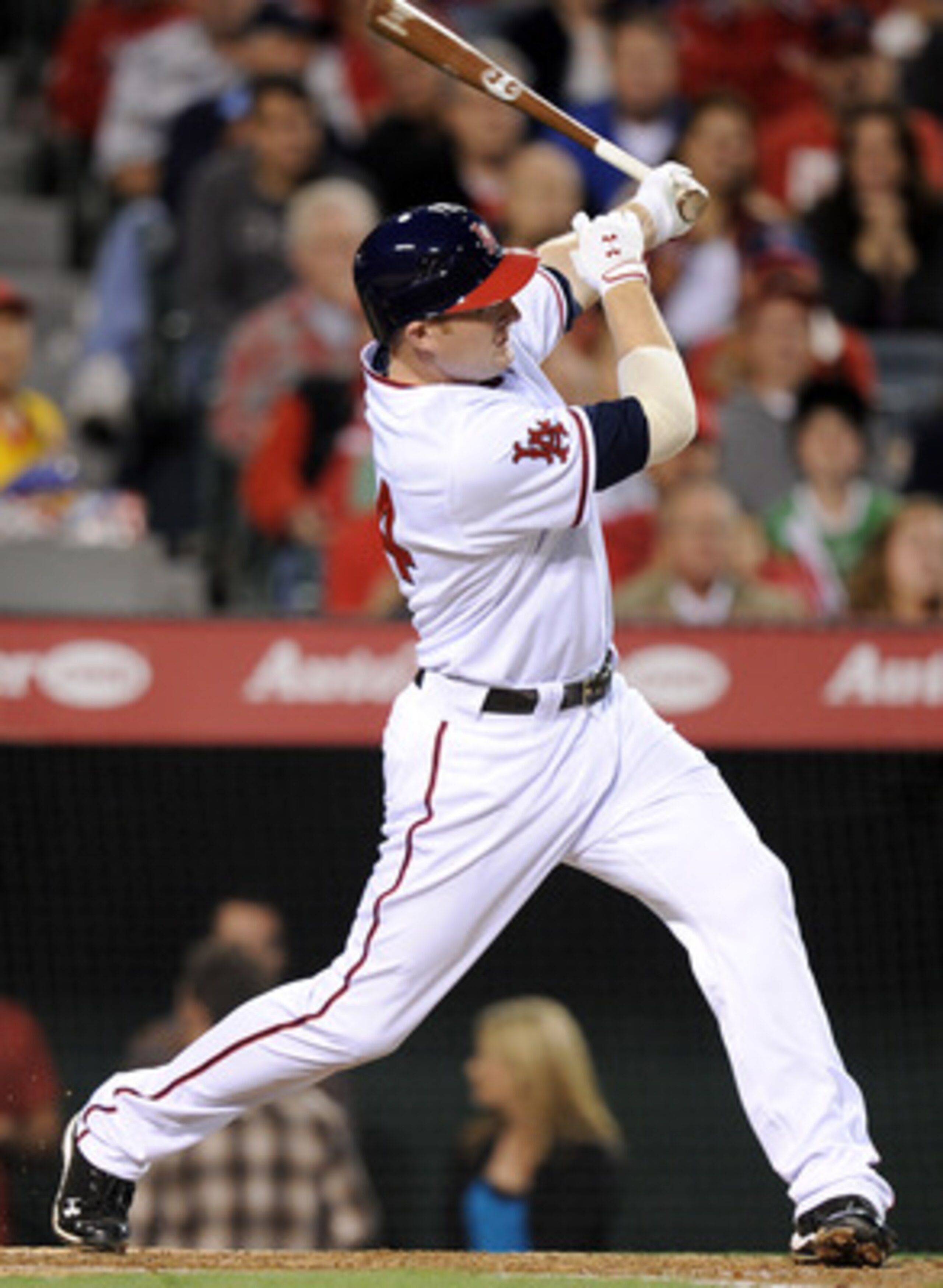 ANAHEIM, CA - MAY 20:  Mark Trumbo #44 of the Los Angeles Angels of Anaheim hits a three run homerun for a 6-0 lead over the Atlanta Braves during the third inning at Angel Stadium on May 20, 2011 in Anaheim, California.  (Photo by Harry How/Getty Images)