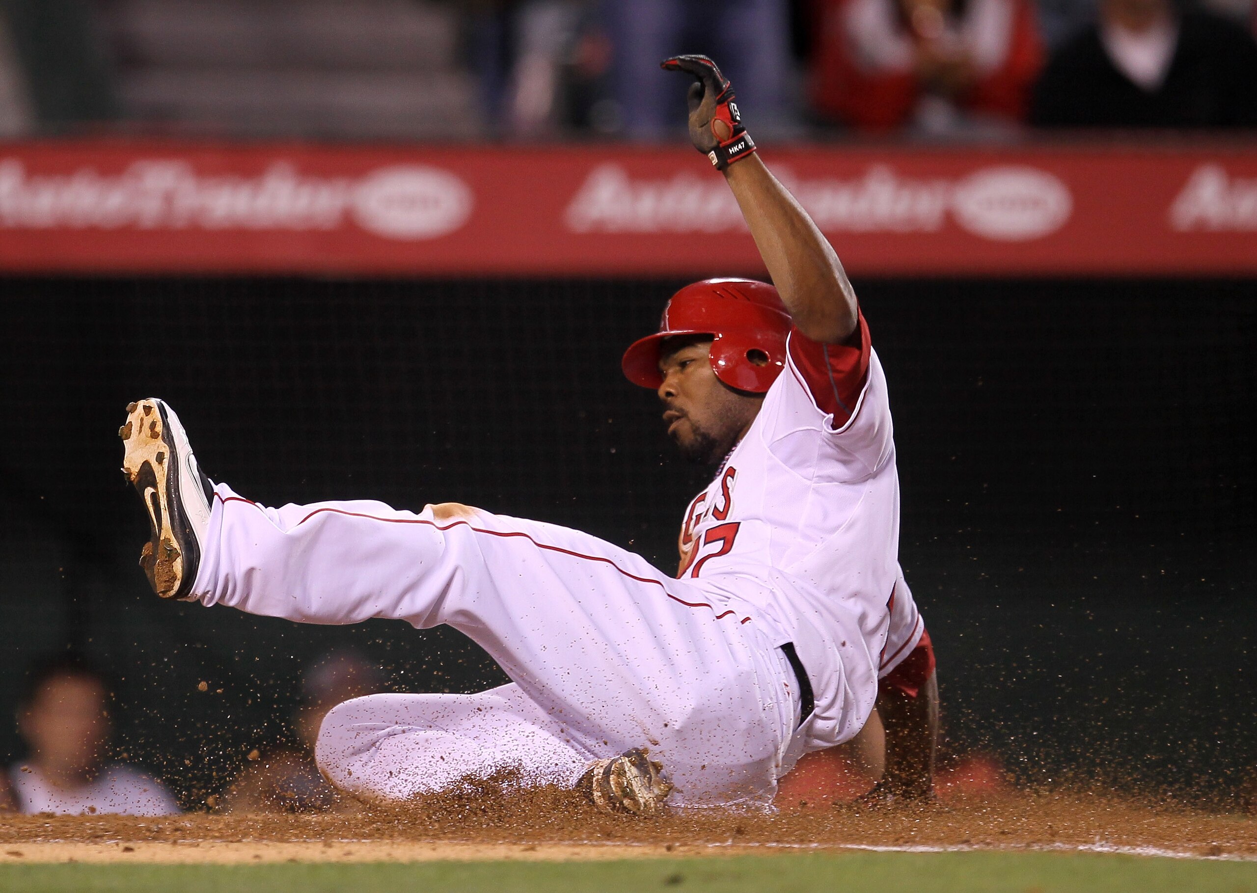 ANAHEIM, CA - MAY 10: Howie Kendrick #47 of the Los Angeles Angels of Anaheim slides home with a run in the third inning against the Chicago White Sox on May 10, 2011 at Angel Stadium in Anaheim, California.   (Photo by Stephen Dunn/Getty Images)