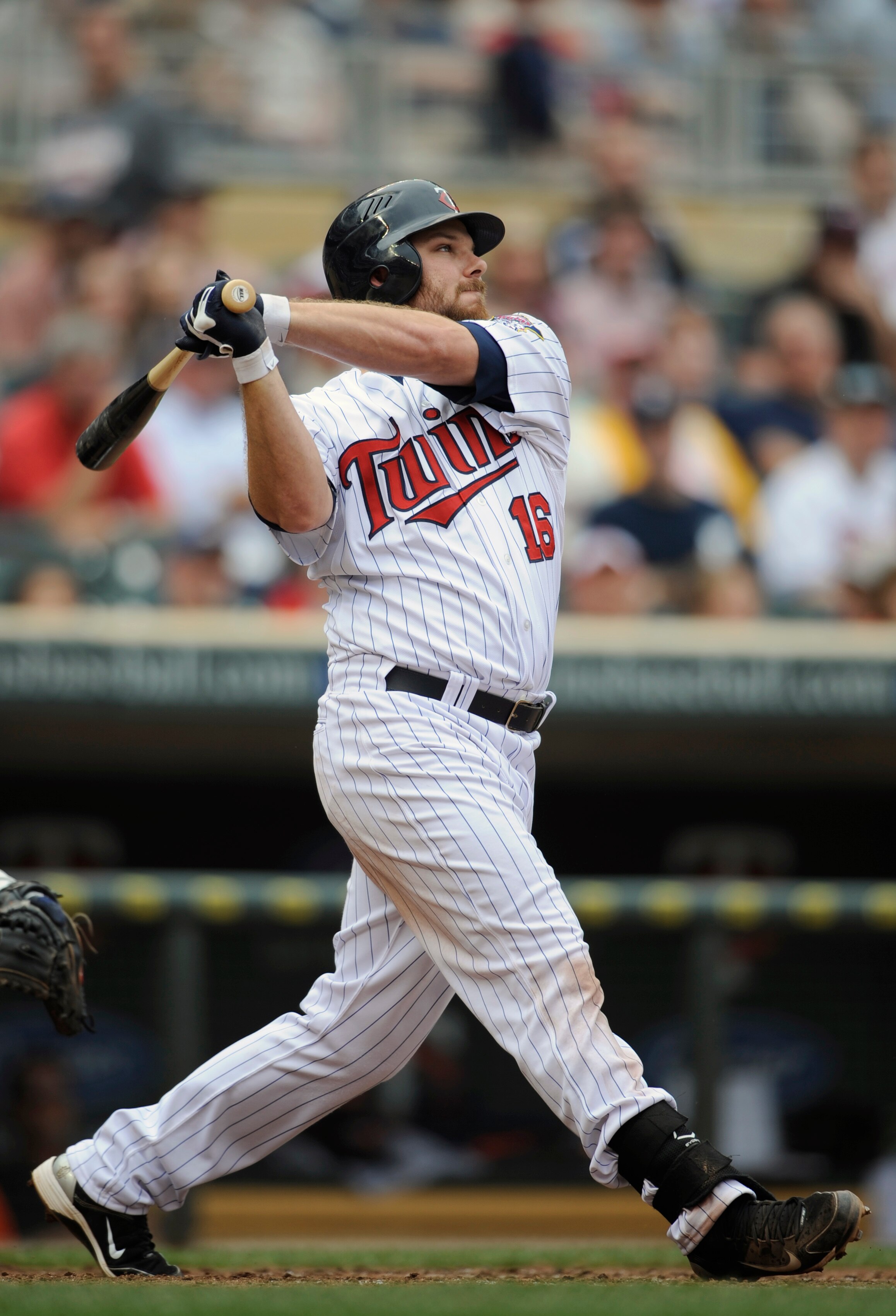 MINNEAPOLIS, MN - MAY 11: Jason Kubel #16 of the Minnesota Twins hits a three-run home run against the Detroit Tigers during in the seventh inning of their game on May 11, 2011 at Target Field in Minneapolis, Minnesota. Tigers defeated the Twins 9-7. (Pho MINNEAPOLIS, MN - MAY 11: Jason Kubel #16 of the Minnesota Twins hits a three-run home run against the Detroit Tigers during in the seventh inning of their game on May 11, 2011 at Target Field in Minneapolis, Minnesota. Tigers defeated the Twins 9-7. (Pho