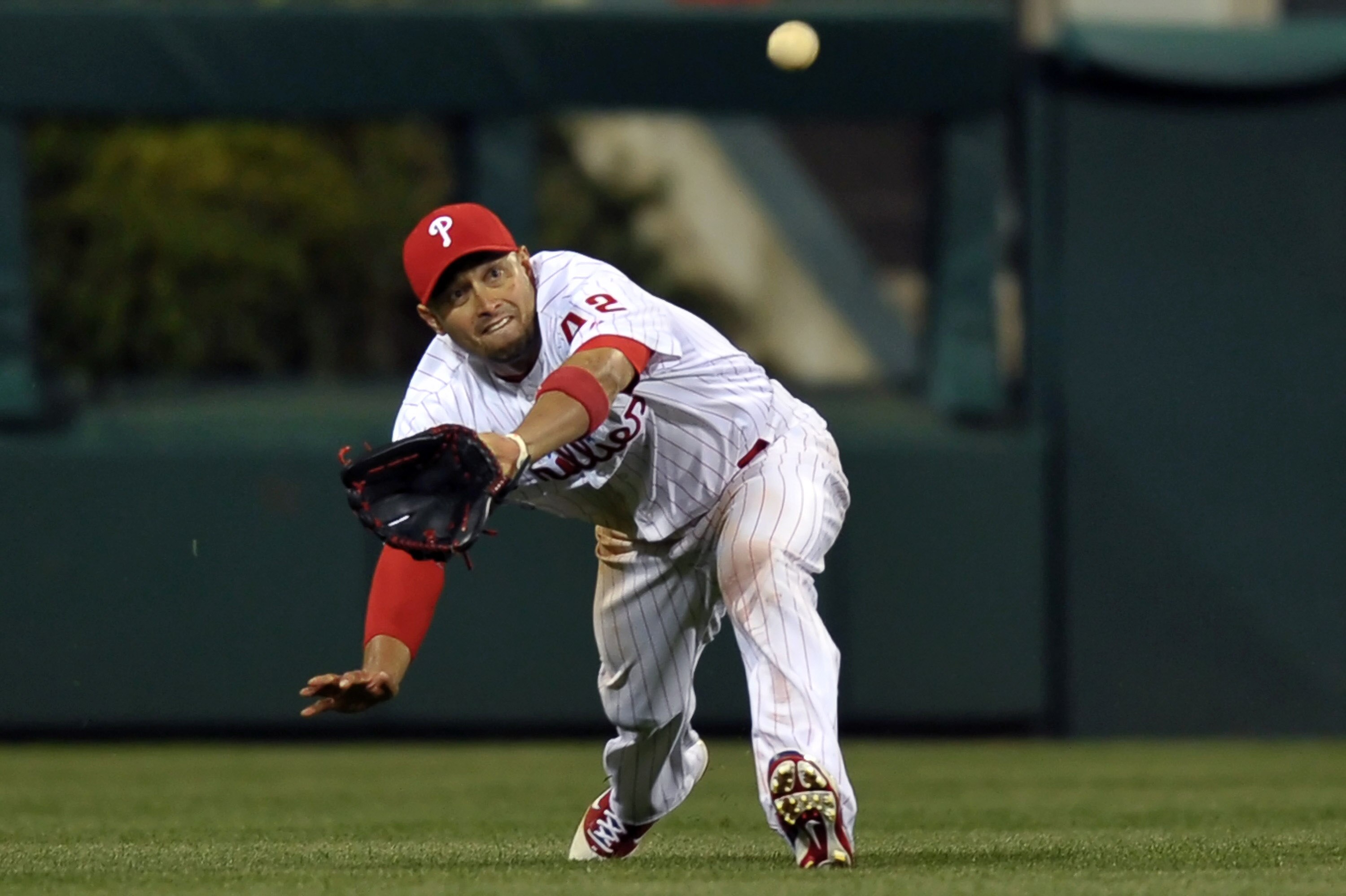PHILADELPHIA, PA - APRIL 15: Shane Victorino #8 of the Philadelphia Phillies catches a fly ball during the game against the Florida Marlins at Citizens Bank Park on April 15, 2011 in Philadelphia, Pennsylvania. The Marlins won 4-3. (Photo by Drew Hallowel PHILADELPHIA, PA - APRIL 15: Shane Victorino #8 of the Philadelphia Phillies catches a fly ball during the game against the Florida Marlins at Citizens Bank Park on April 15, 2011 in Philadelphia, Pennsylvania. The Marlins won 4-3. (Photo by Drew Hallowel
