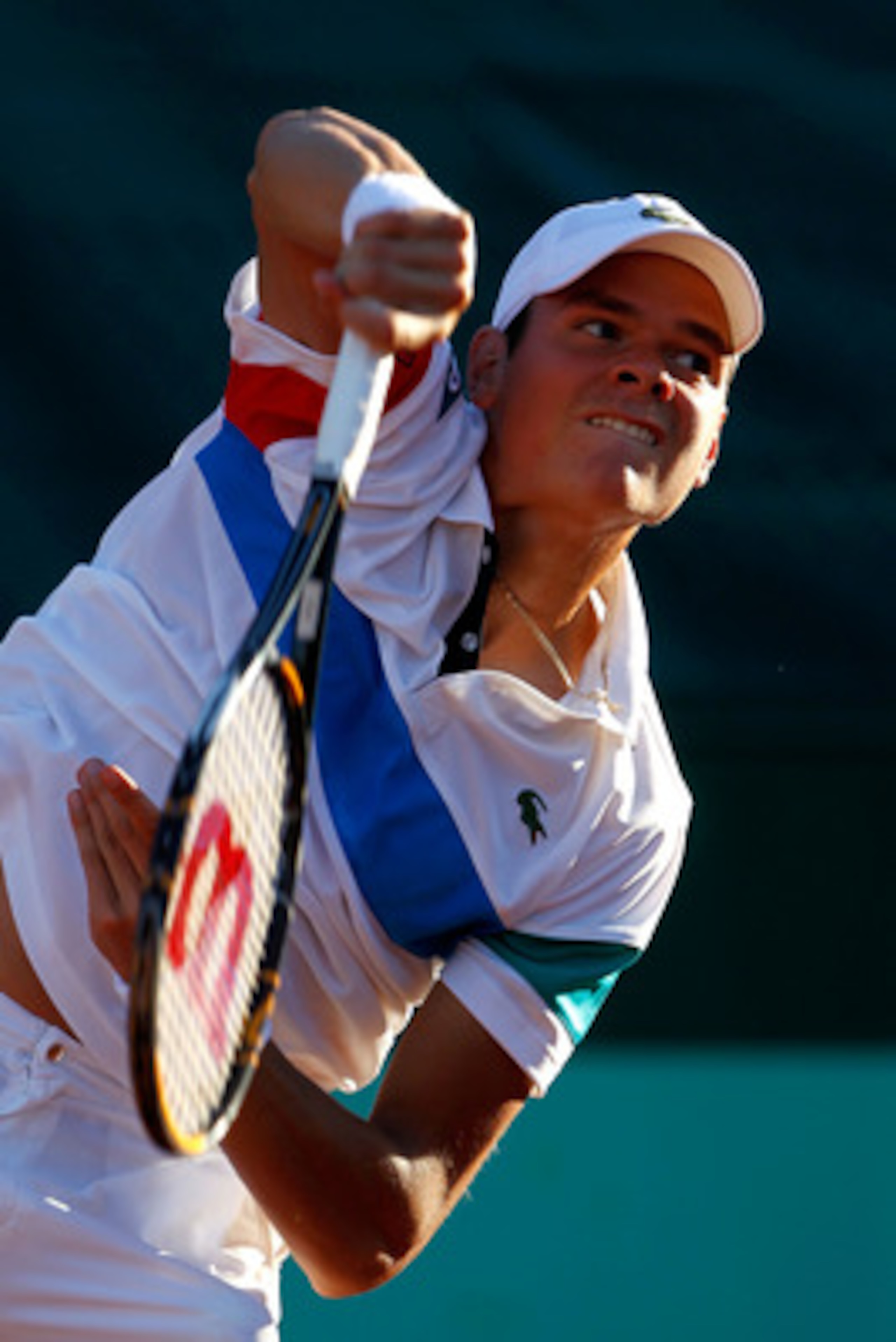 PARIS, FRANCE - MAY 23:  Milos Raonic of Canada serves during the men's singles first round match between Michael Berrer of Germany and Milos Raonic of Canada on day two of the French Open at Roland Garros on May 23, 2011 in Paris, France.  (Photo by Matt